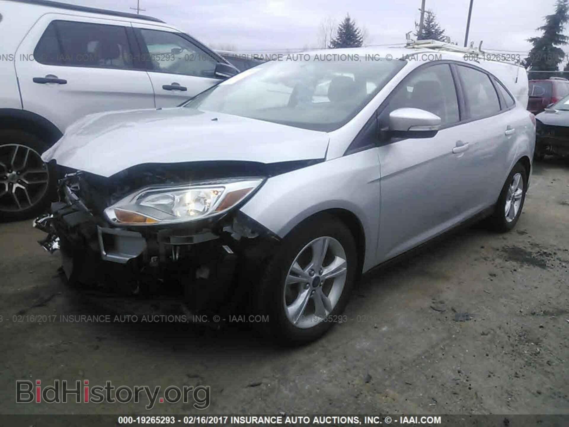 2014 Ford Focus - VIN: 1FADP3F21EL329986 - Фото 2