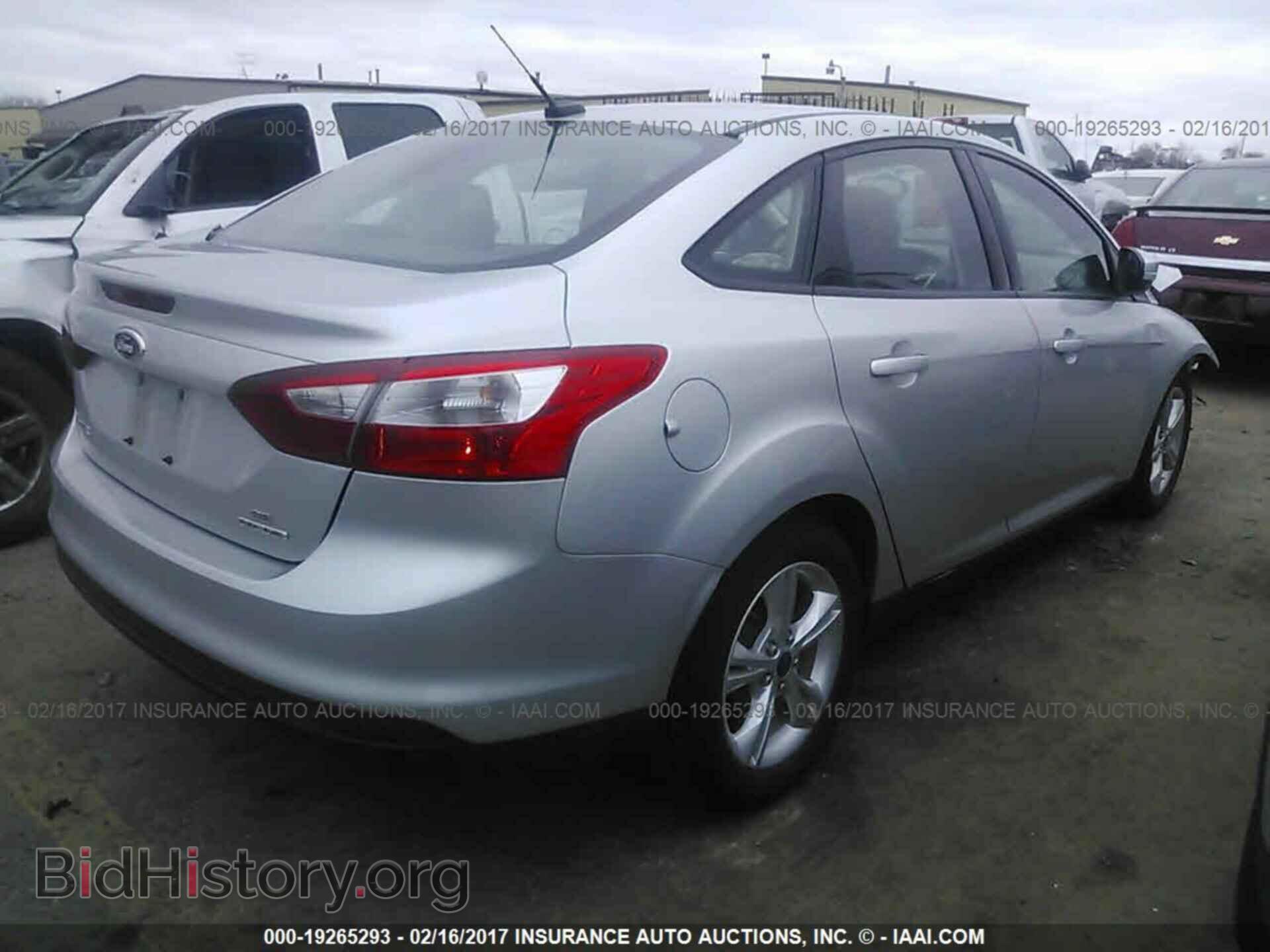 2014 Ford Focus - VIN: 1FADP3F21EL329986 - Фото 4