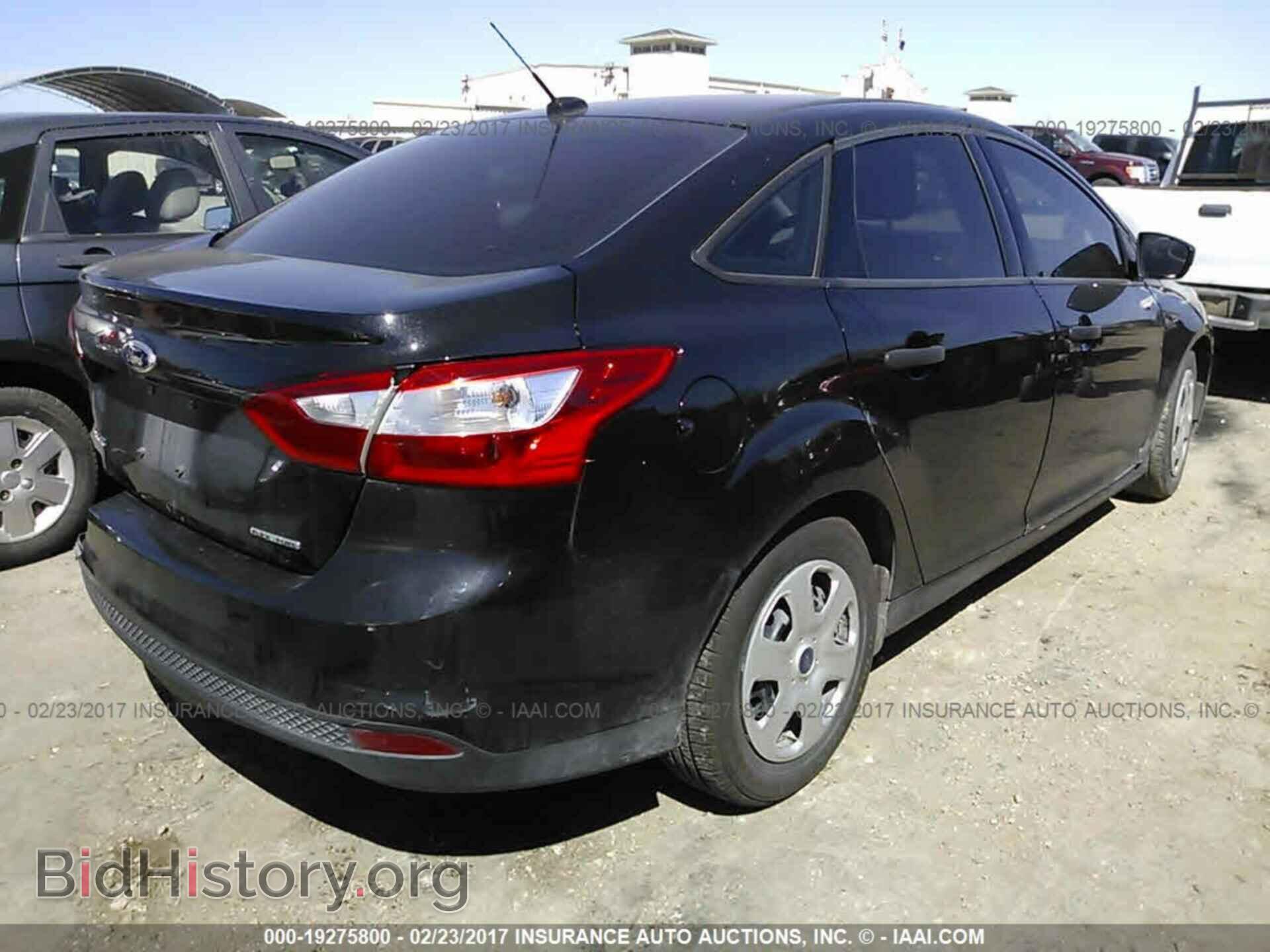 2014 Ford Focus - VIN: 1FADP3E29EL372876 - Photo 4