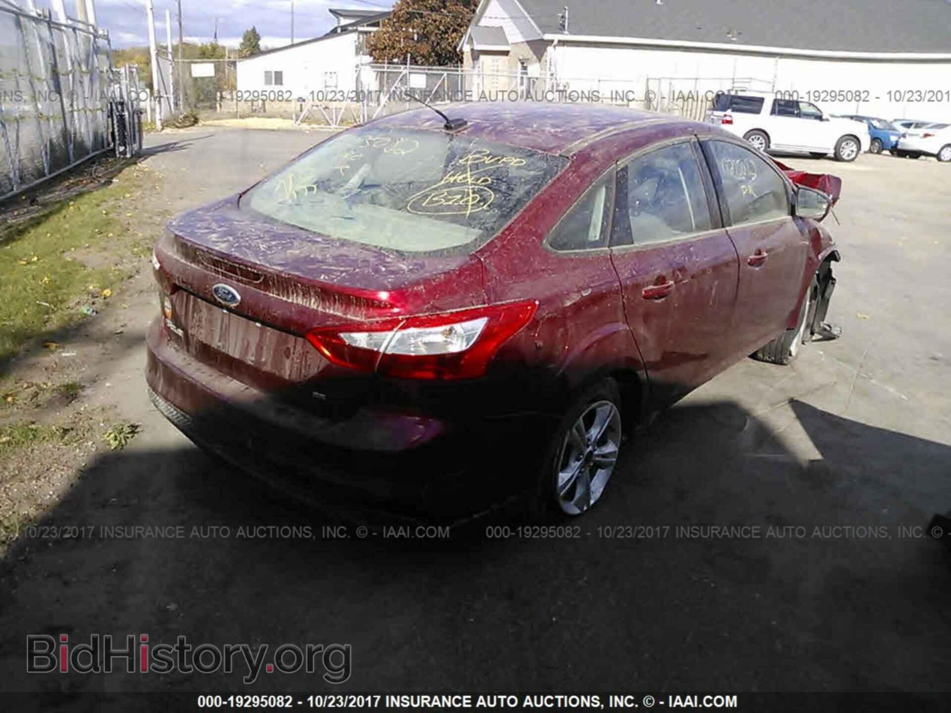 2014 Ford Focus - VIN: 1FADP3F22EL318981 - Фото 4