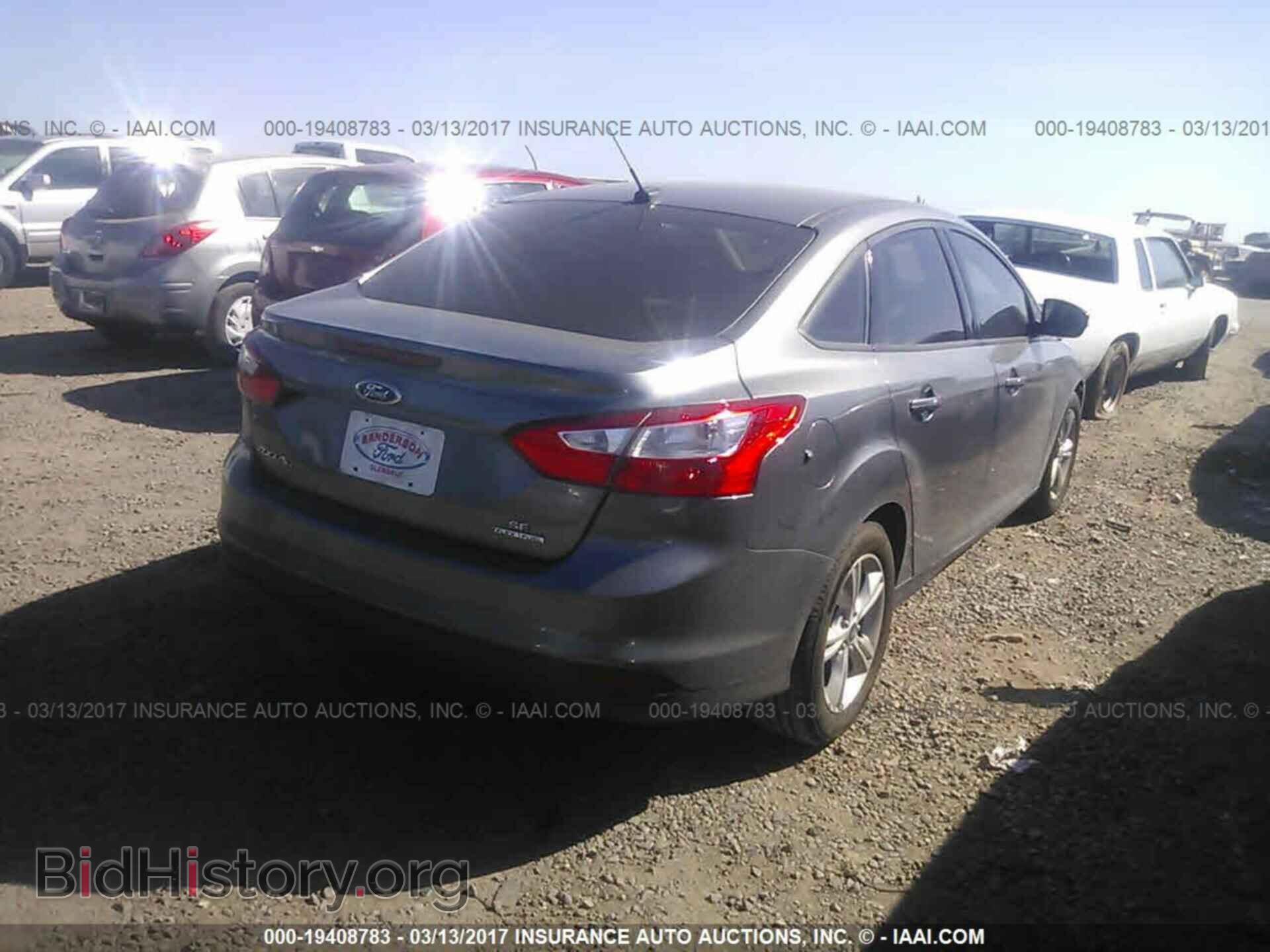 2014 Ford Focus - VIN: 1FADP3F21EL453675 - Photo 4