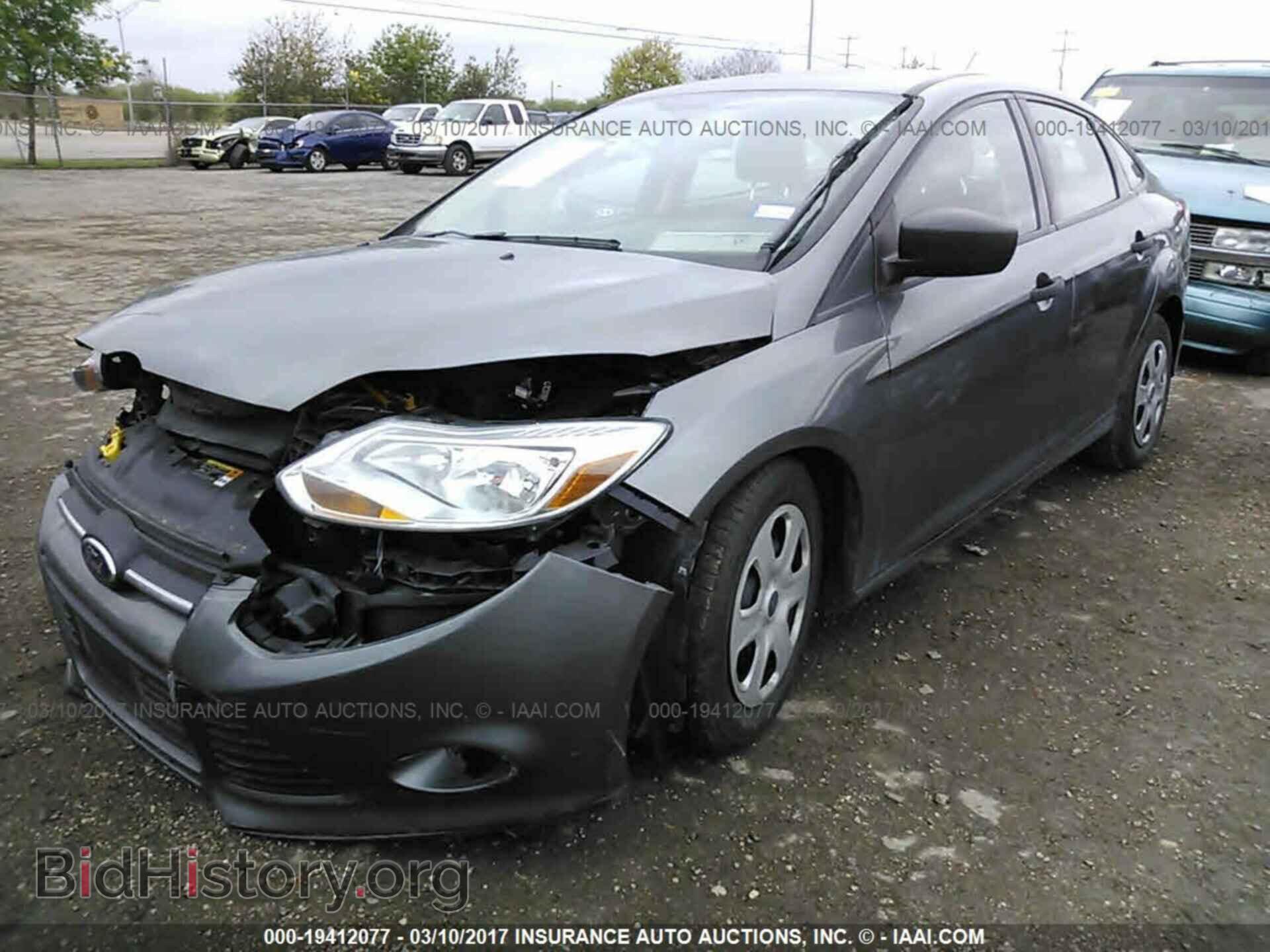 2014 Ford Focus - VIN: 1FADP3E20EL130719 - Фото 2