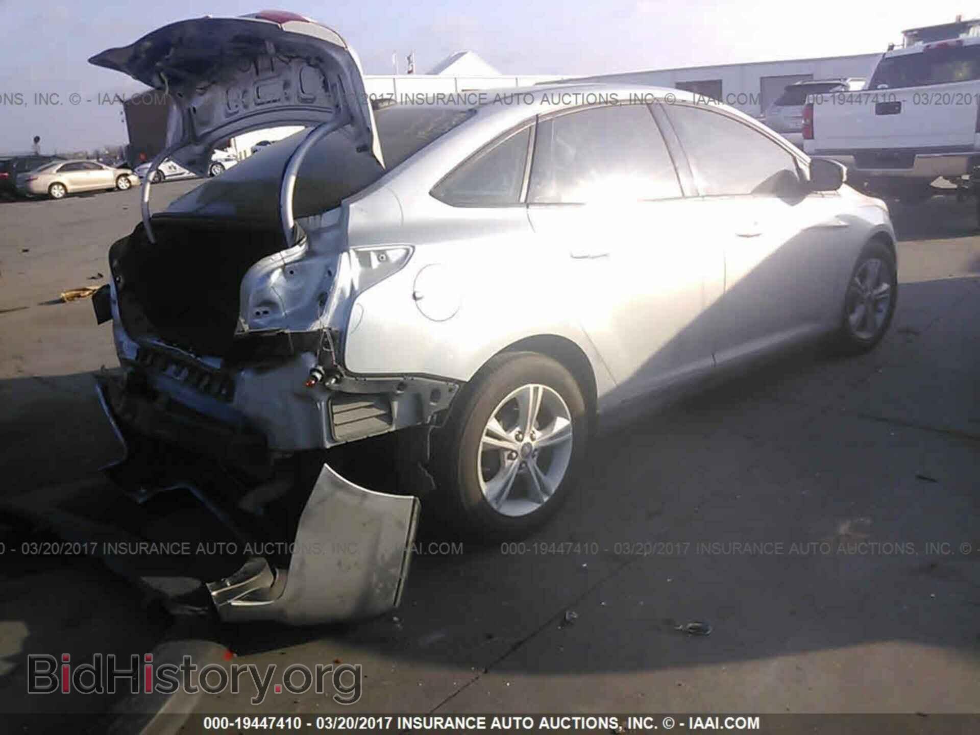2014 Ford Focus - VIN: 1FADP3F21EL439825 - Photo 4