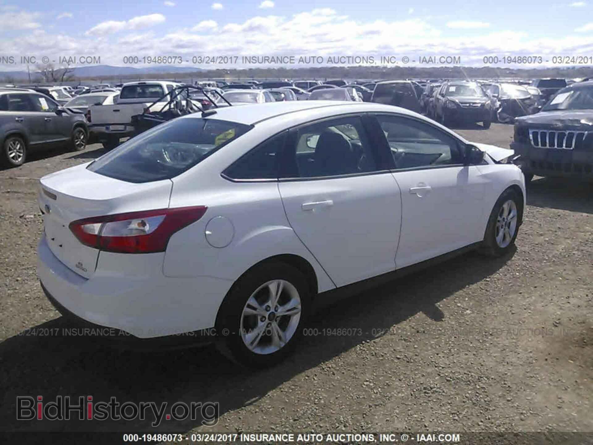 2013 Ford Focus - VIN: 1FADP3F2XDL123905 - Photo 4