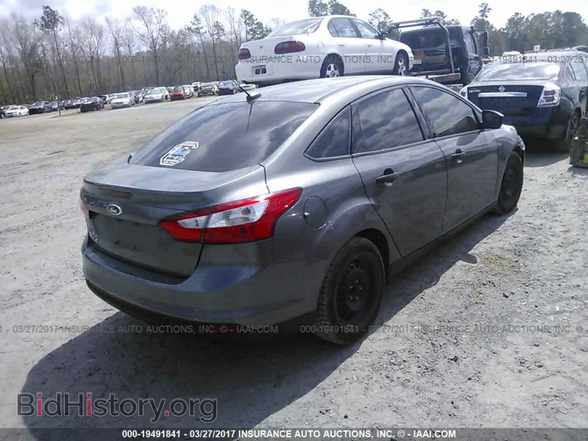2012 Ford Focus - VIN: 1FAHP3E27CL330608 - Photo 4