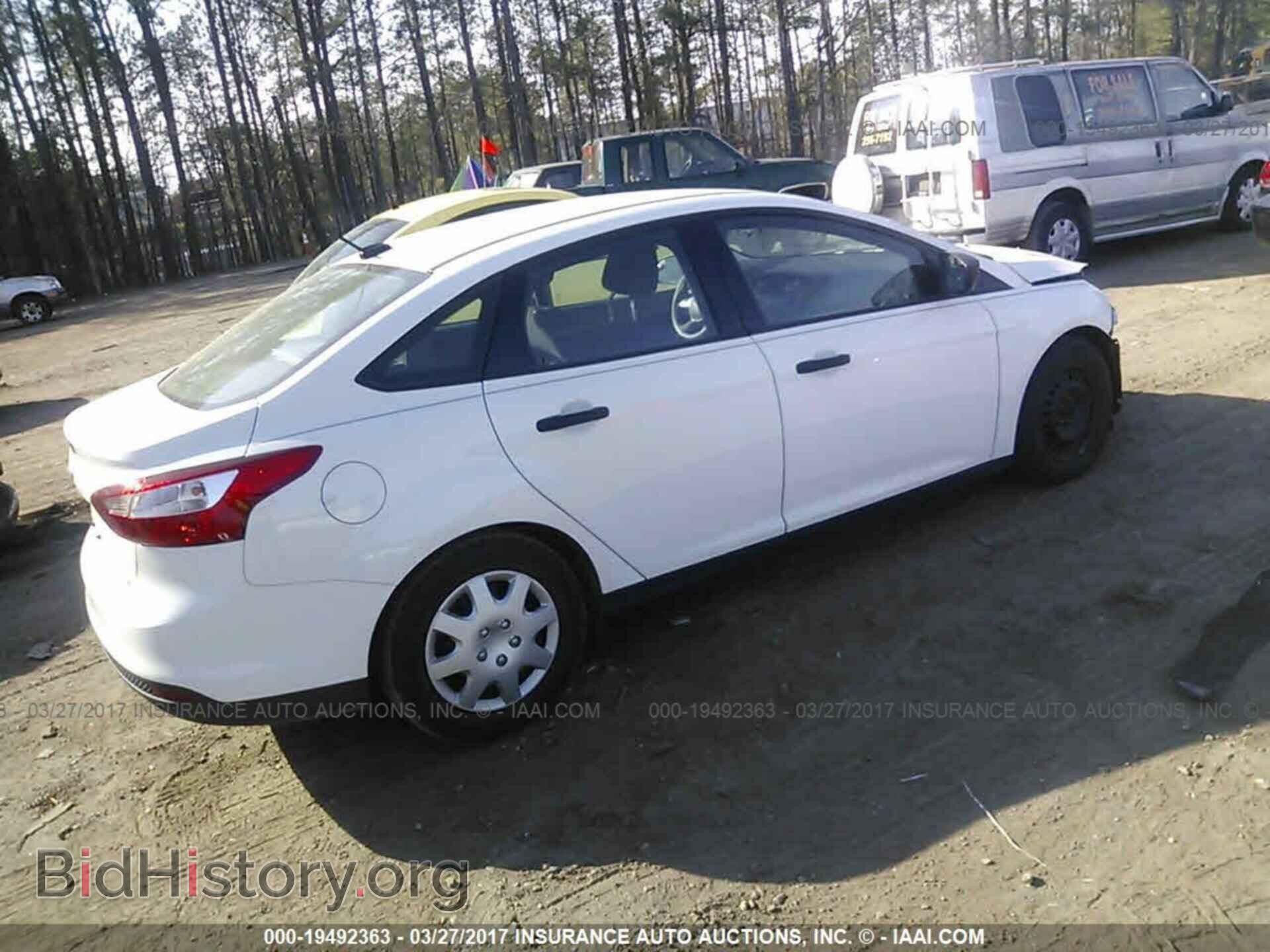 2014 Ford Focus - VIN: 1FADP3E23EL309921 - Photo 4