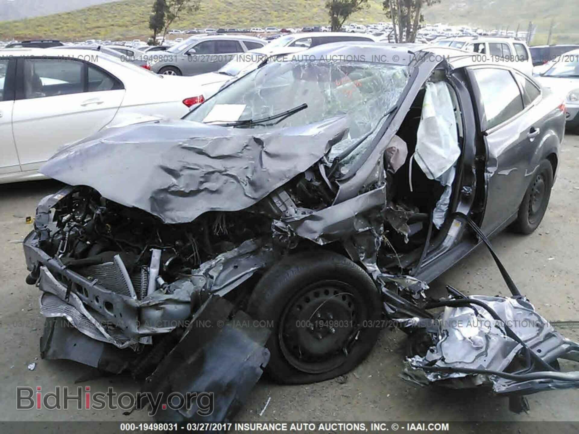 2014 Ford Focus - VIN: 1FADP3F25EL432750 - Фото 2