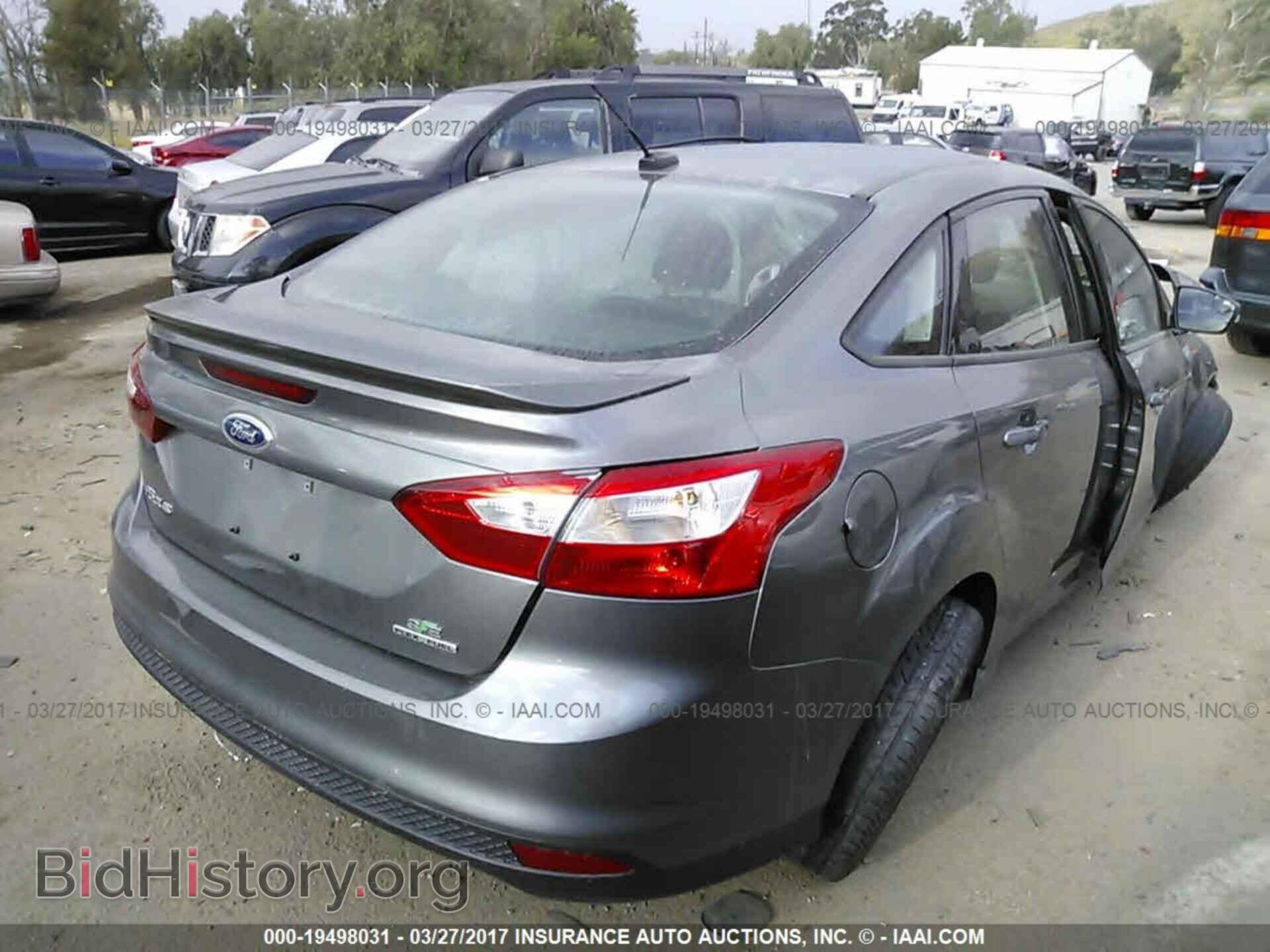 2014 Ford Focus - VIN: 1FADP3F25EL432750 - Фото 4