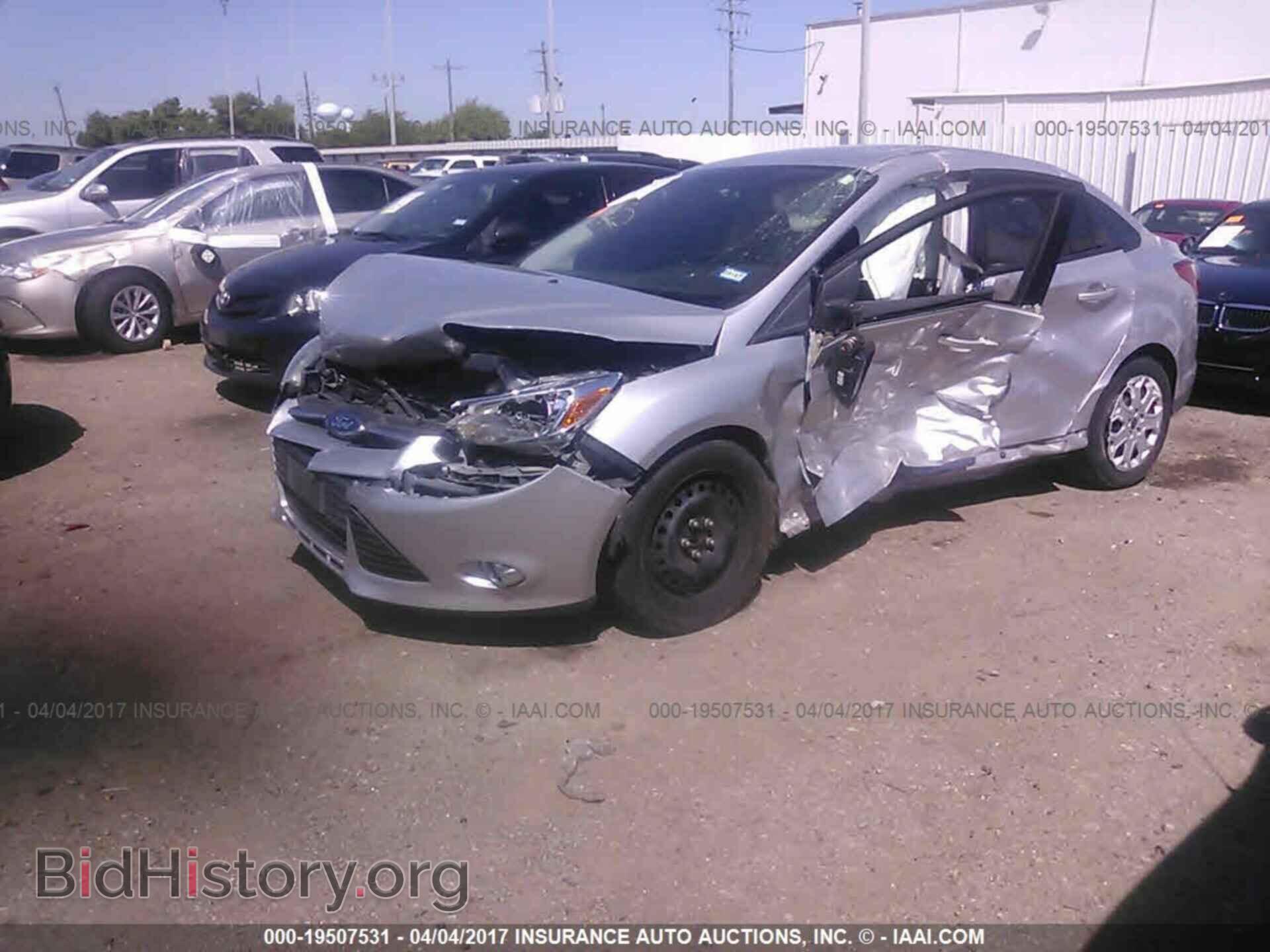 2012 Ford Focus - VIN: 1FAHP3F21CL234990 - Фото 2