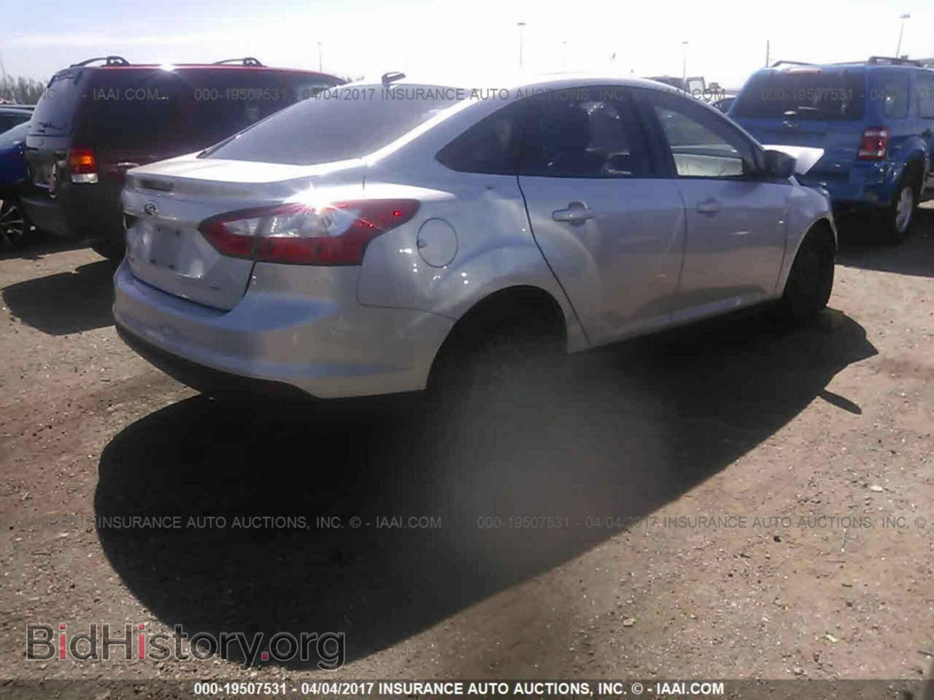 2012 Ford Focus - VIN: 1FAHP3F21CL234990 - Фото 4