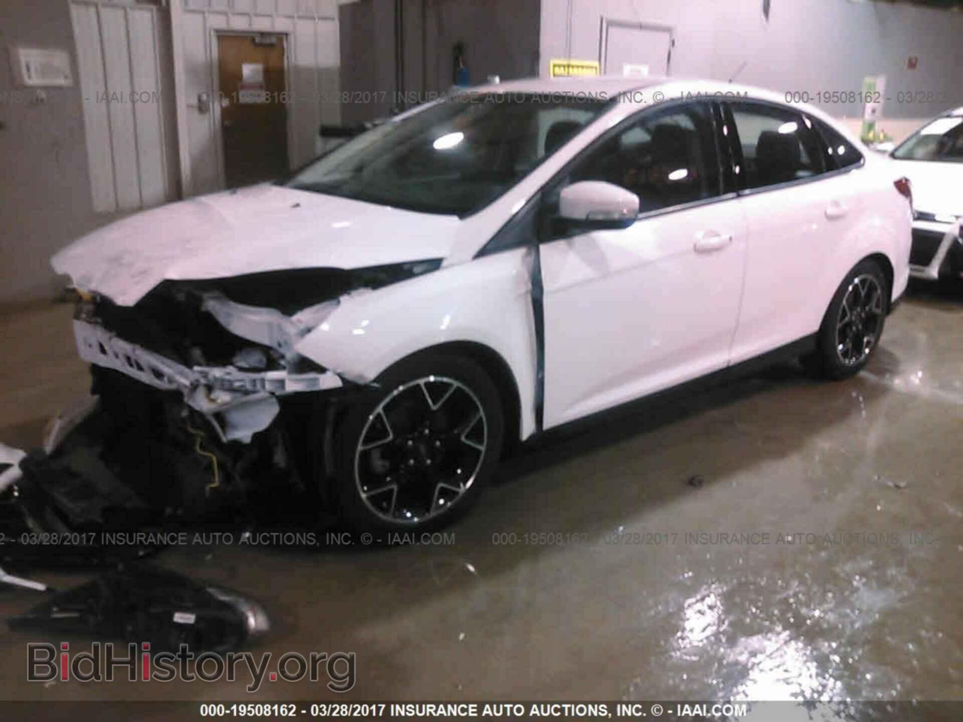 2014 Ford Focus - VIN: 1FADP3F22EL166734 - Фото 2