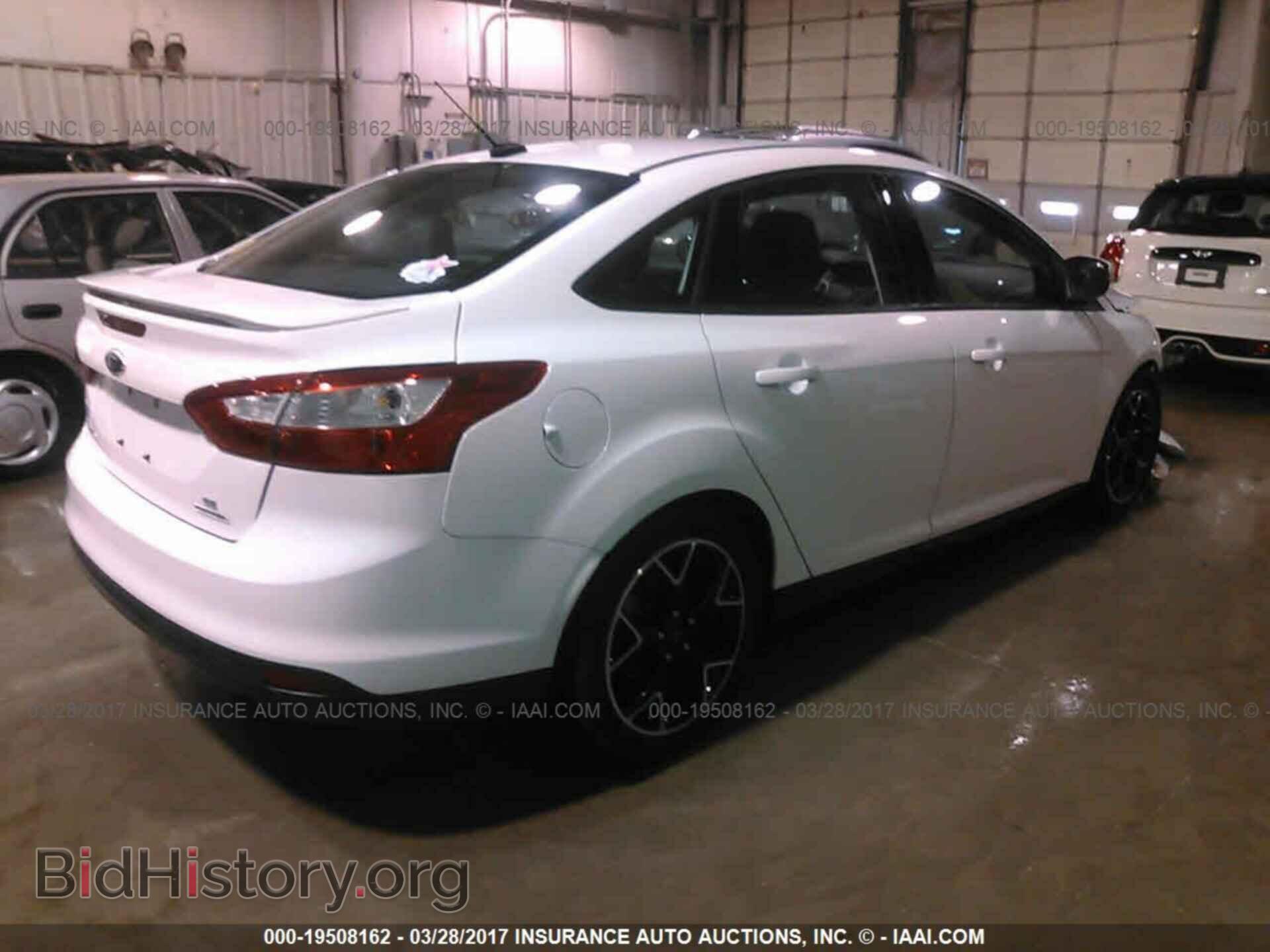 2014 Ford Focus - VIN: 1FADP3F22EL166734 - Фото 4