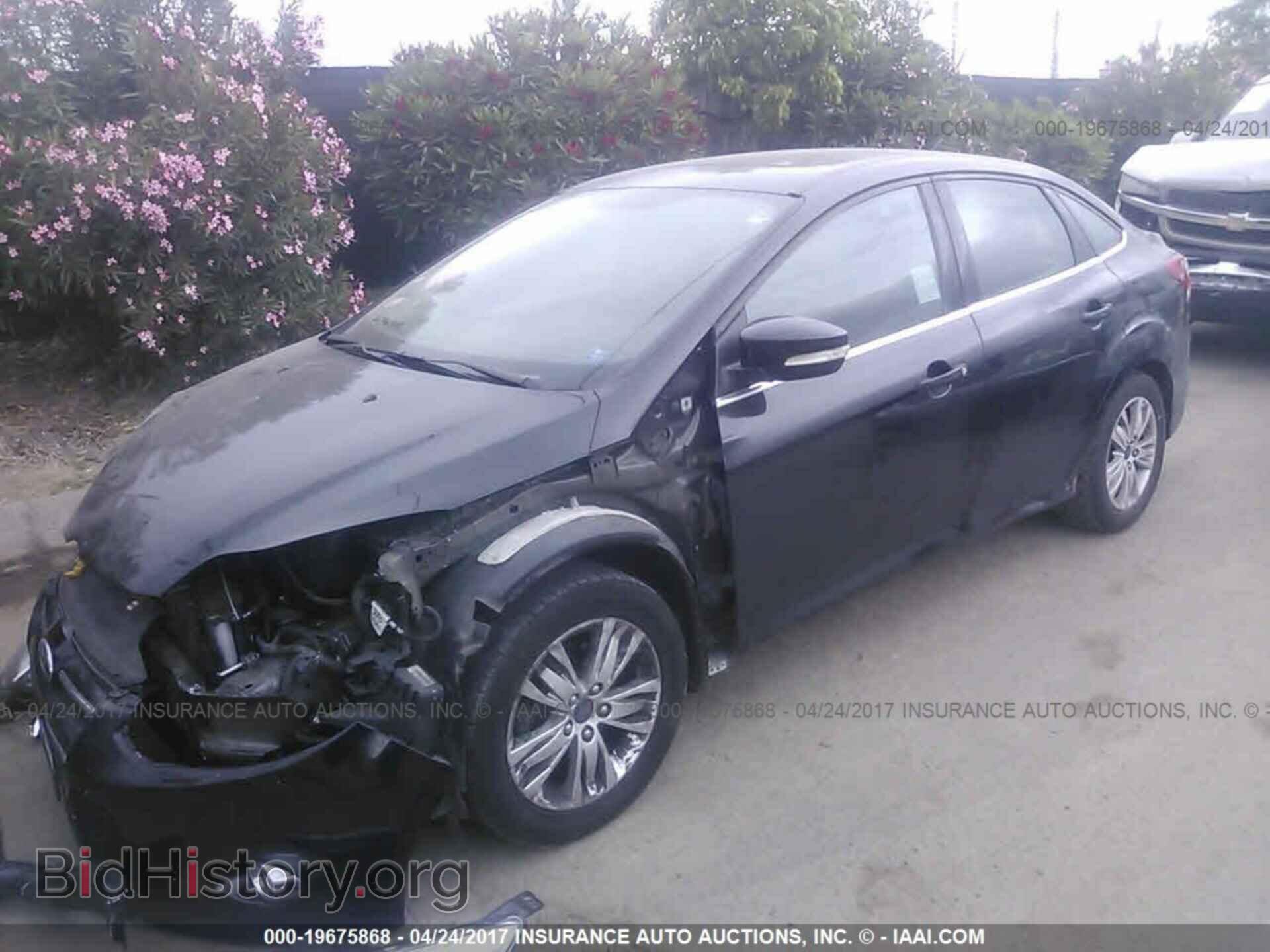 2012 Ford Focus - VIN: 1FAHP3H24CL469302 - Photo 2