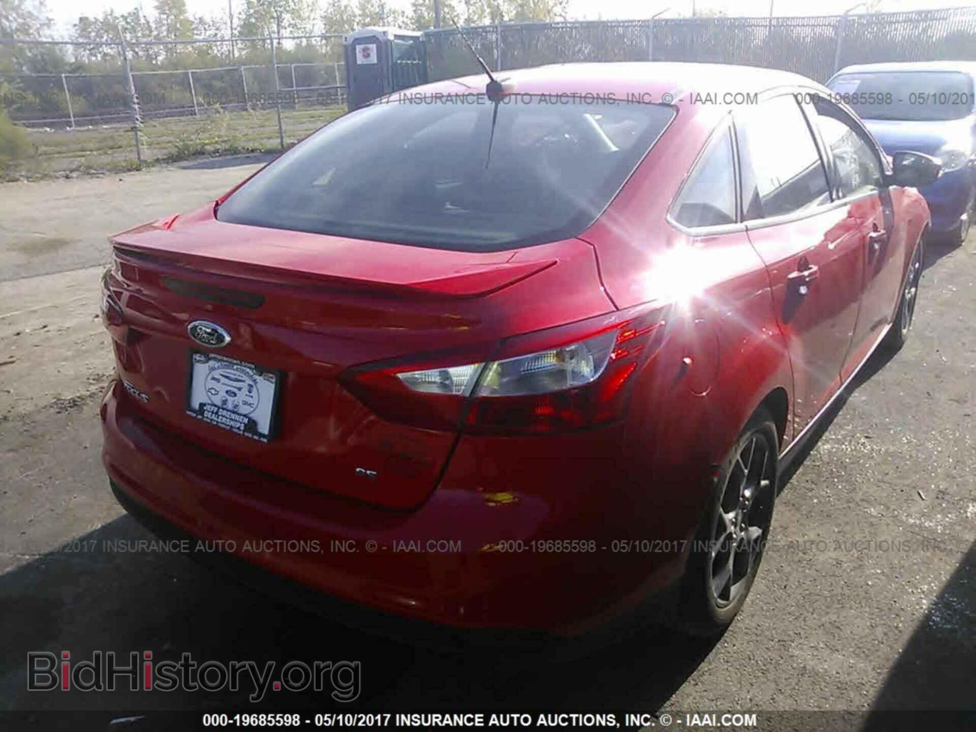 2014 Ford Focus - VIN: 1FADP3F29EL166908 - Photo 4