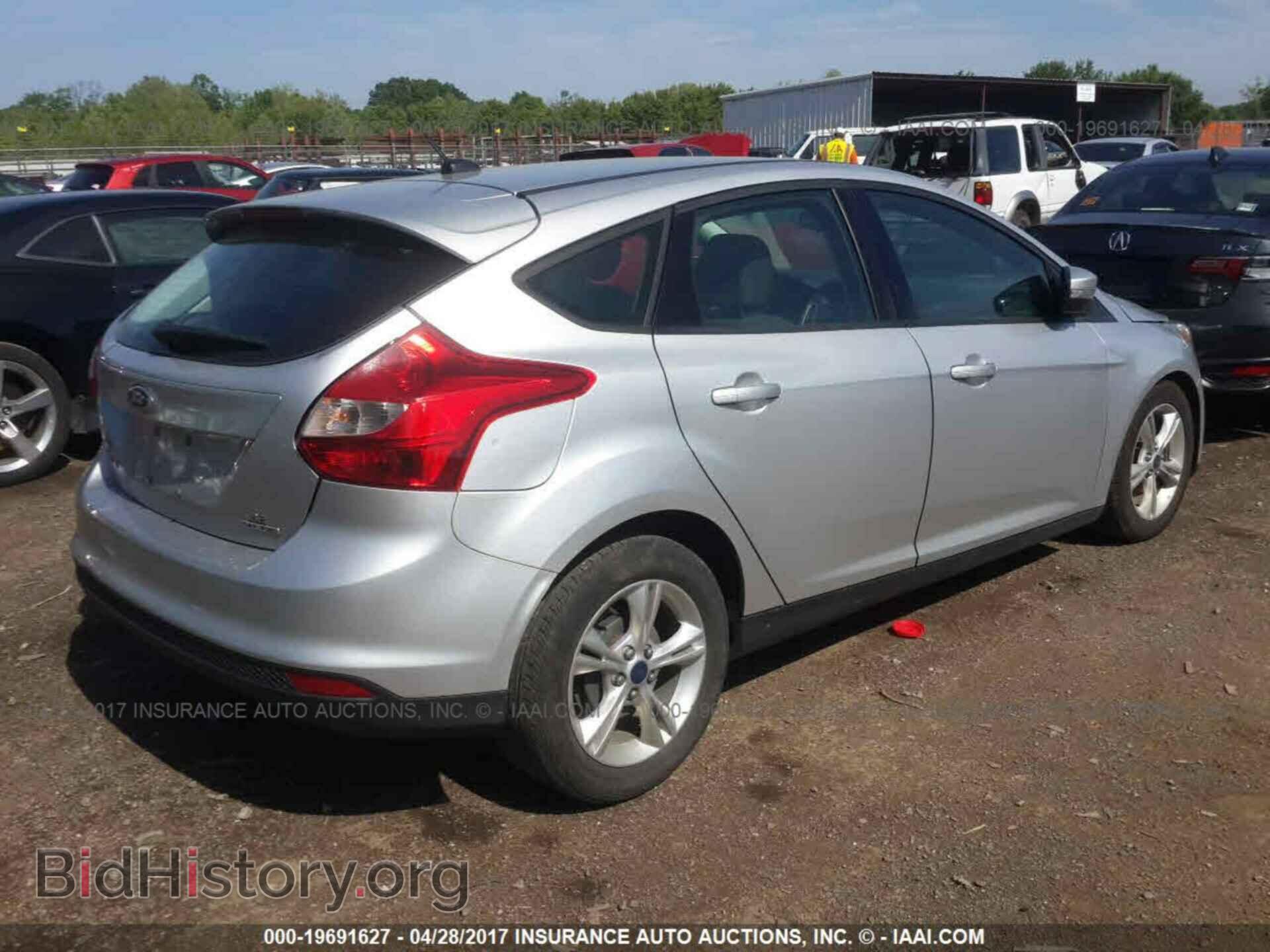 2014 Ford Focus - VIN: 1FADP3K29EL392128 - Фото 4