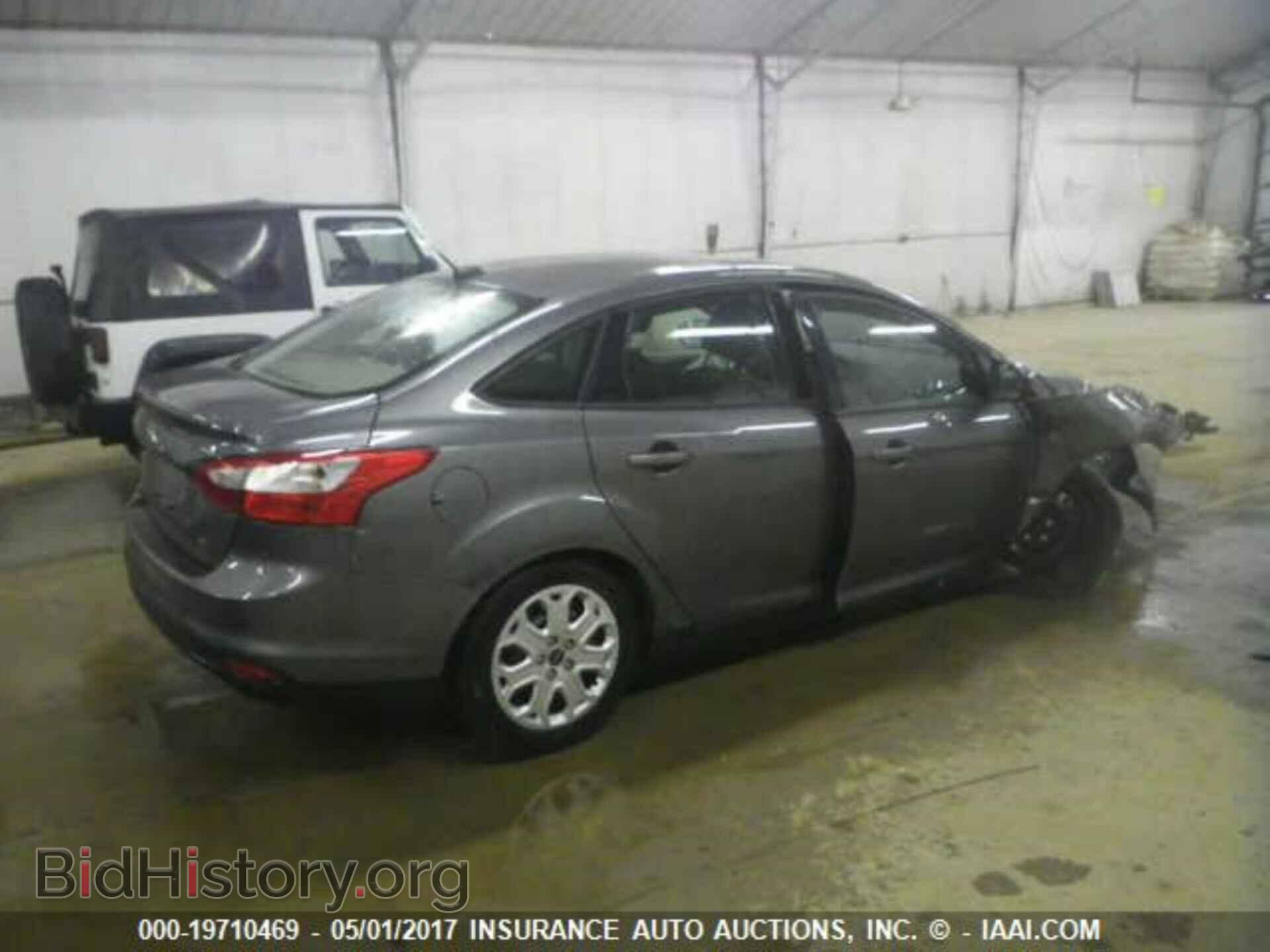 2012 Ford Focus - VIN: 1FAHP3F2XCL323568 - Фото 4