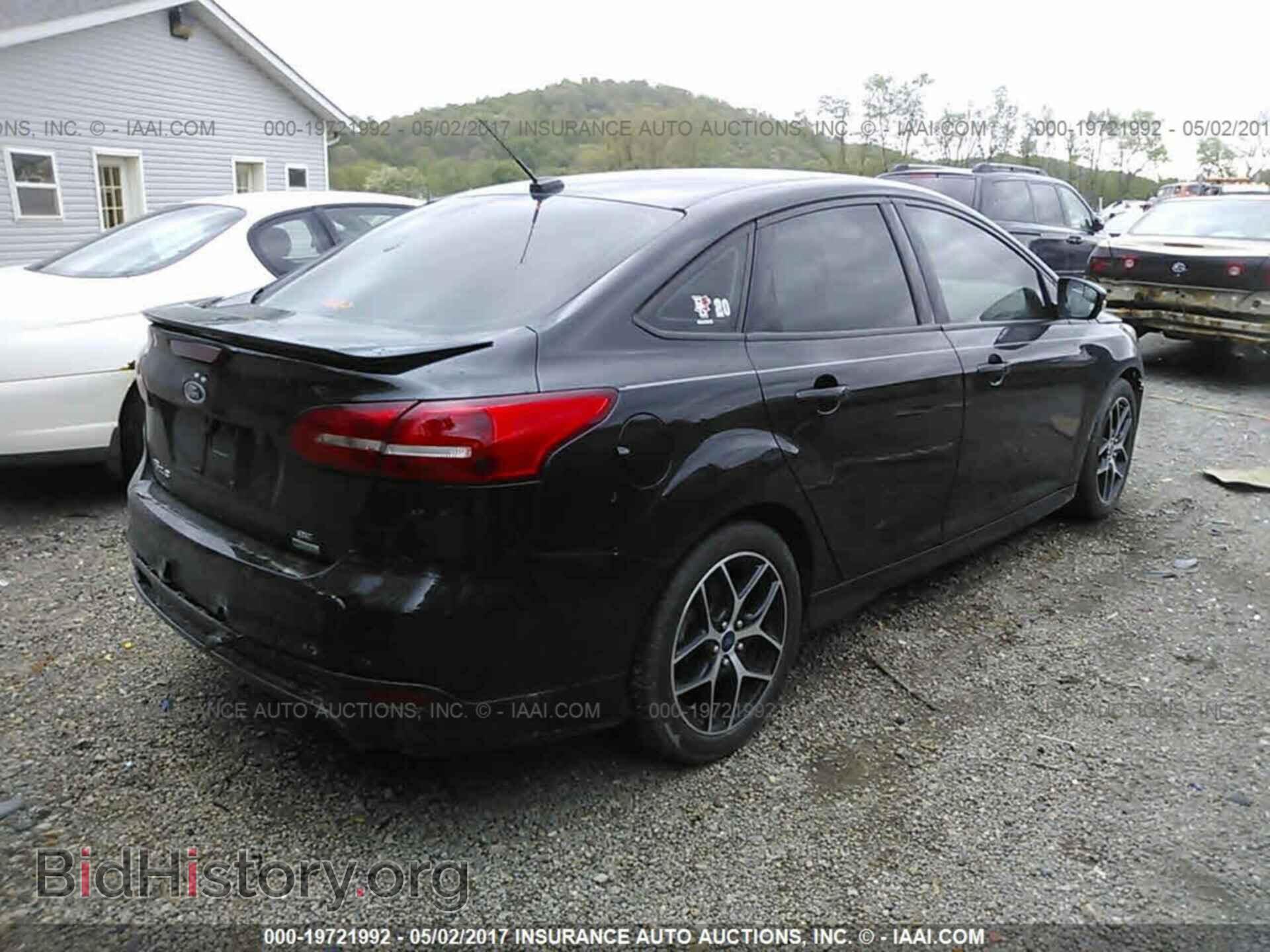 2015 Ford Focus - VIN: 1FADP3FE3FL218660 - Photo 4