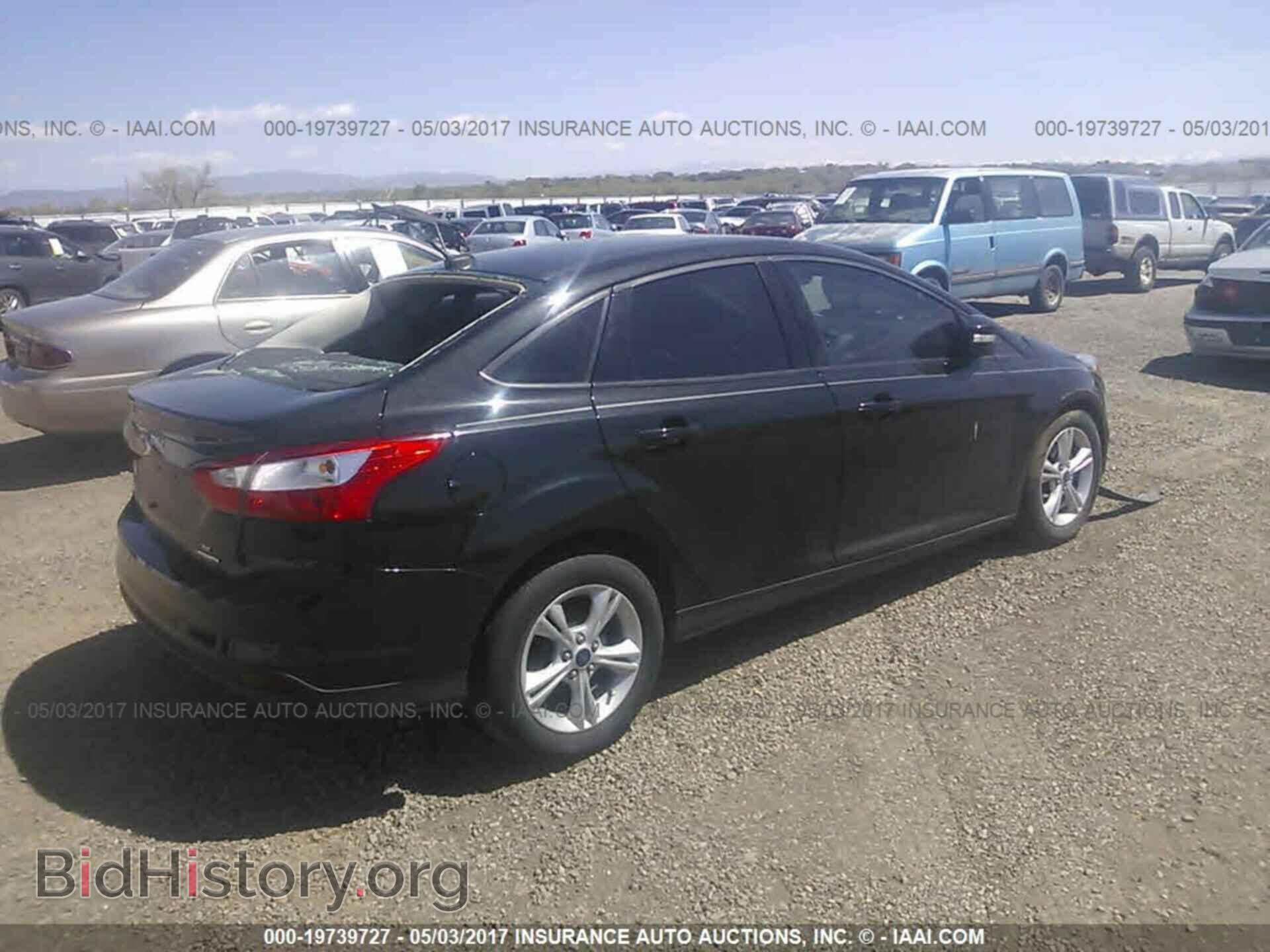 2014 Ford Focus - VIN: 1FADP3F22EL453636 - Фото 4