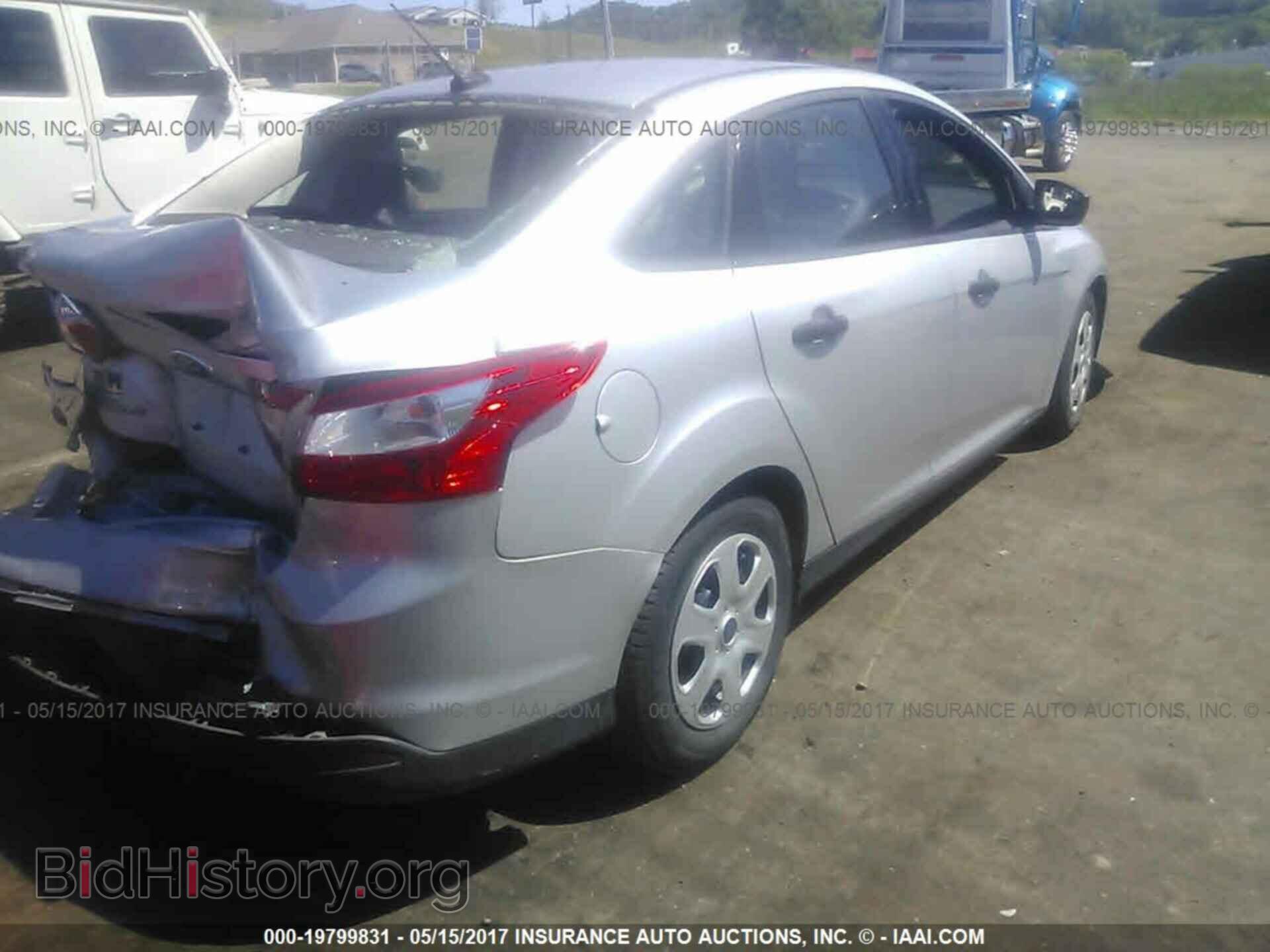 2014 Ford Focus - VIN: 1FADP3E29EL410834 - Фото 4