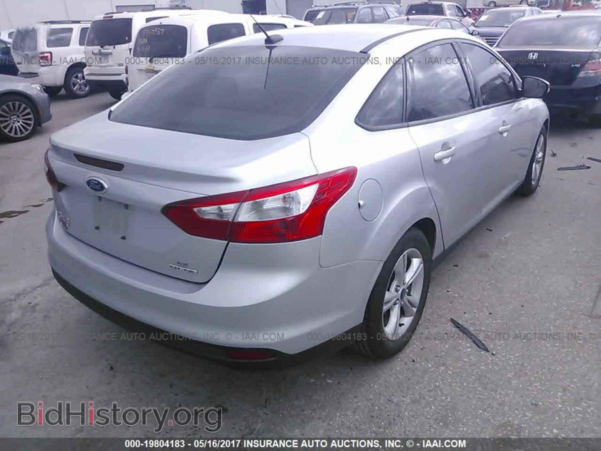 2014 Ford Focus - VIN: 1FADP3F22EL406509 - Photo 4