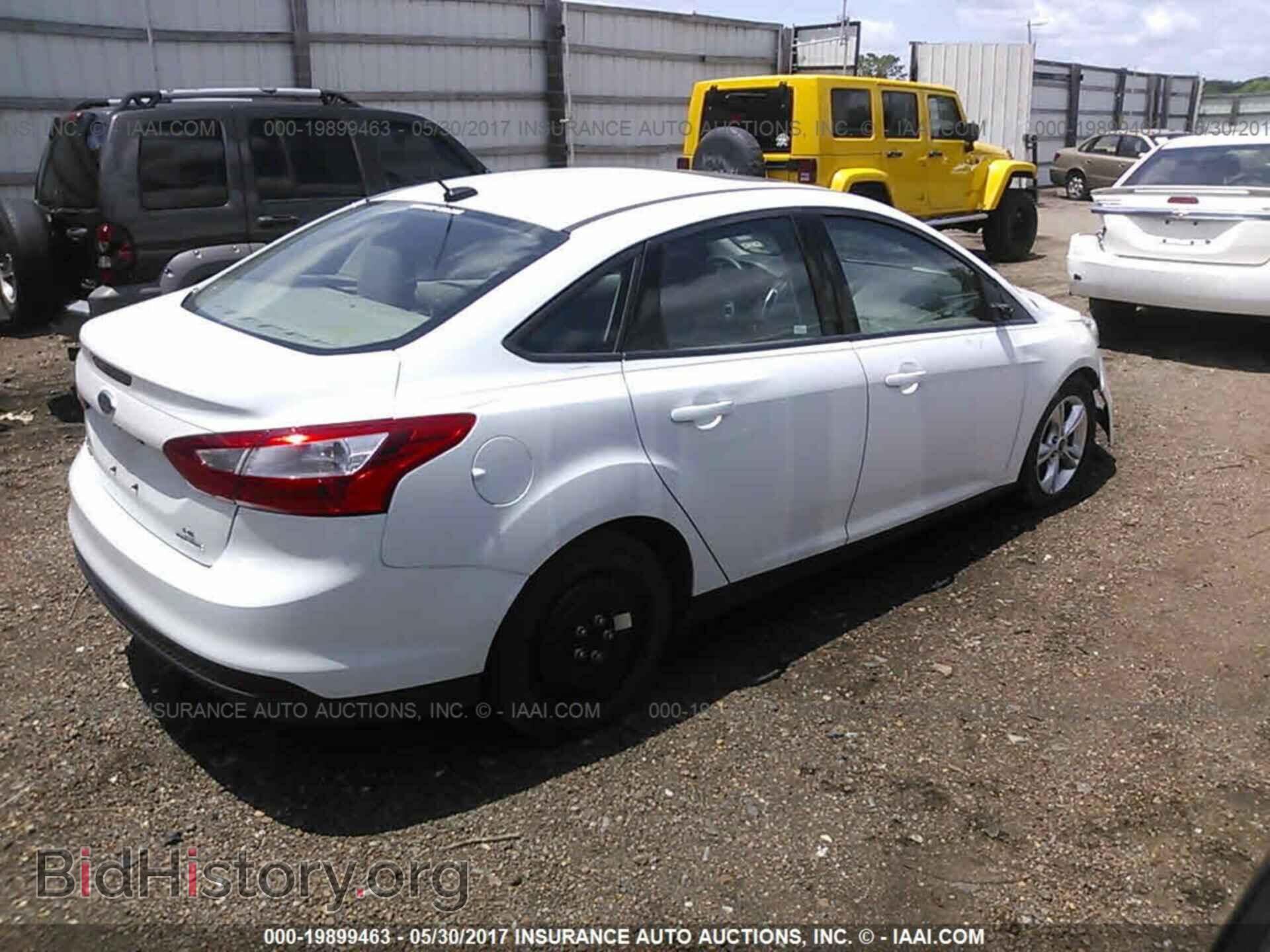 2014 Ford Focus - VIN: 1FADP3F21EL277386 - Фото 4
