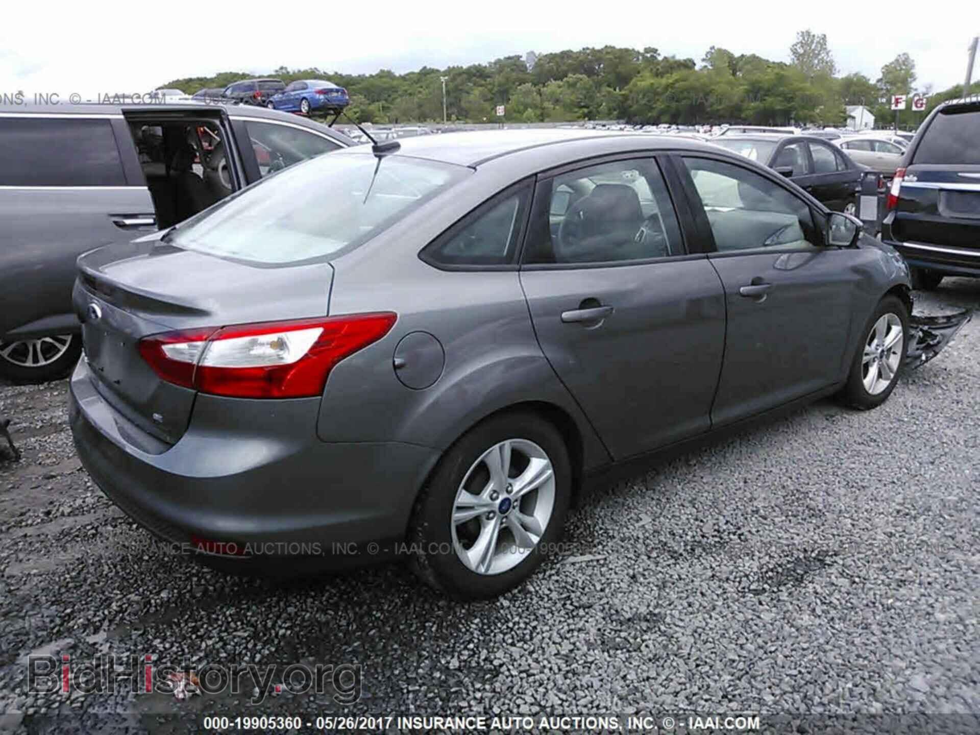 2014 Ford Focus - VIN: 1FADP3F2XEL446479 - Photo 4