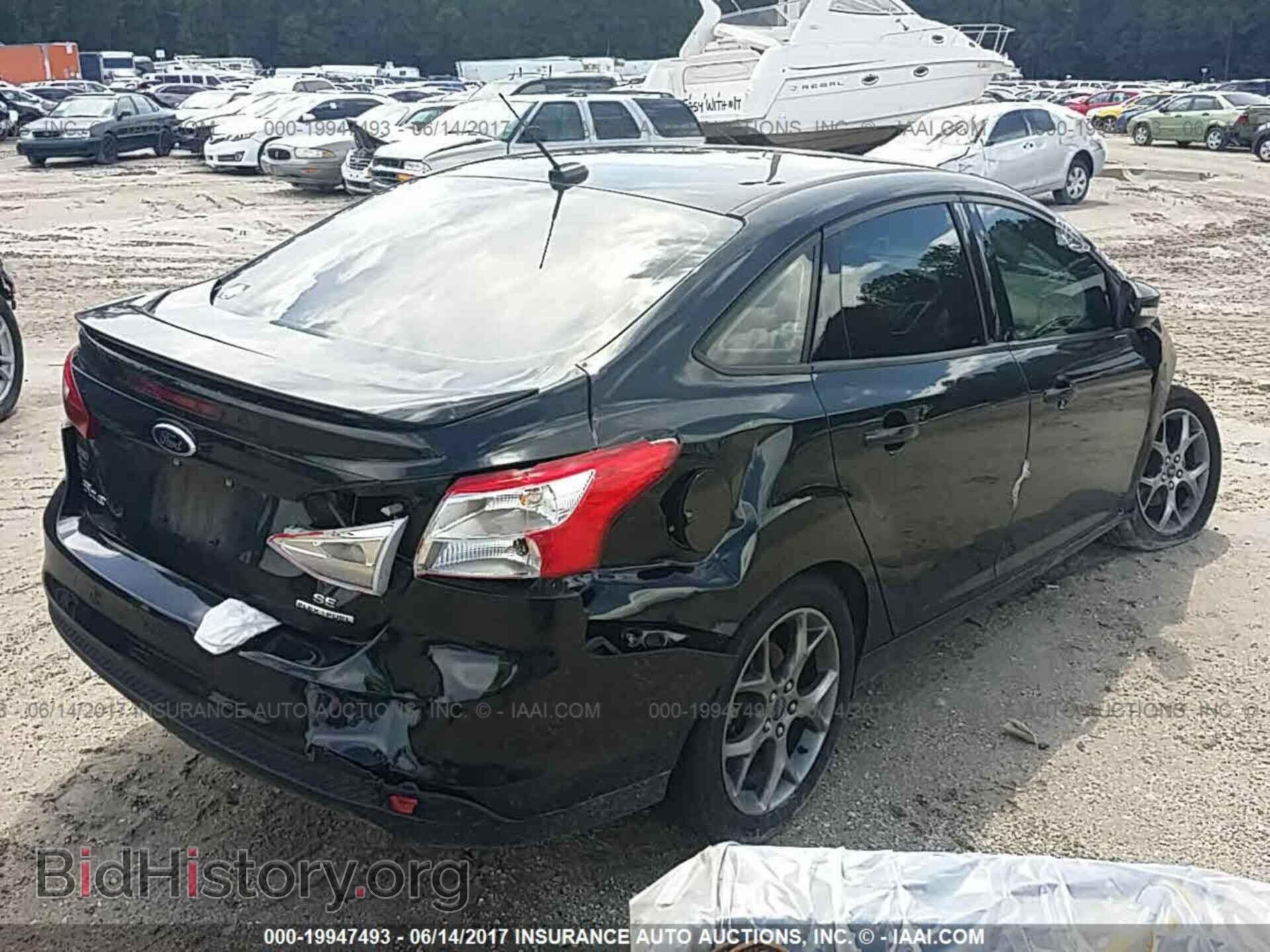 2014 Ford Focus - VIN: 1FADP3F22EL292012 - Photo 4