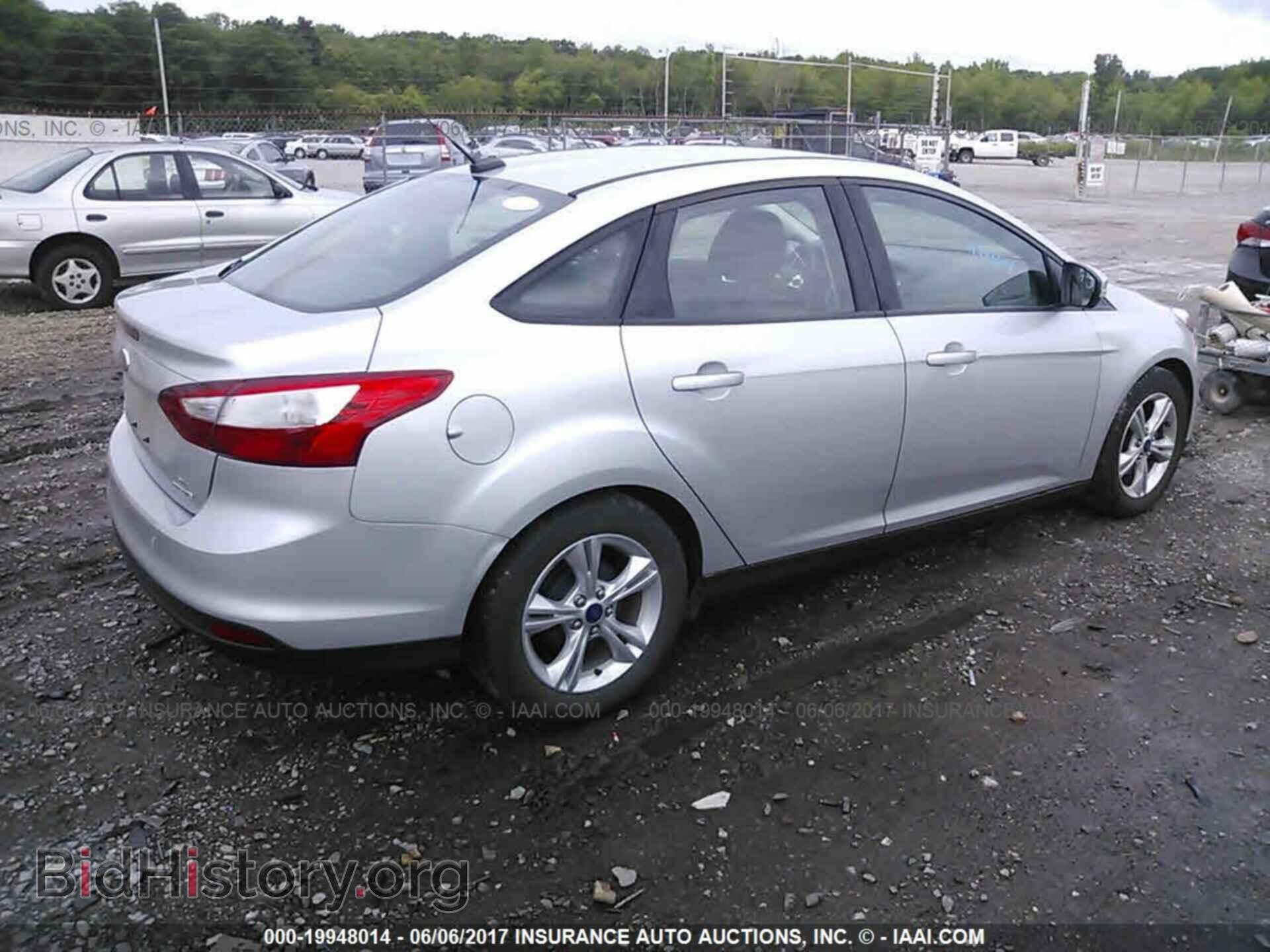 2014 Ford Focus - VIN: 1FADP3F21EL345136 - Фото 4