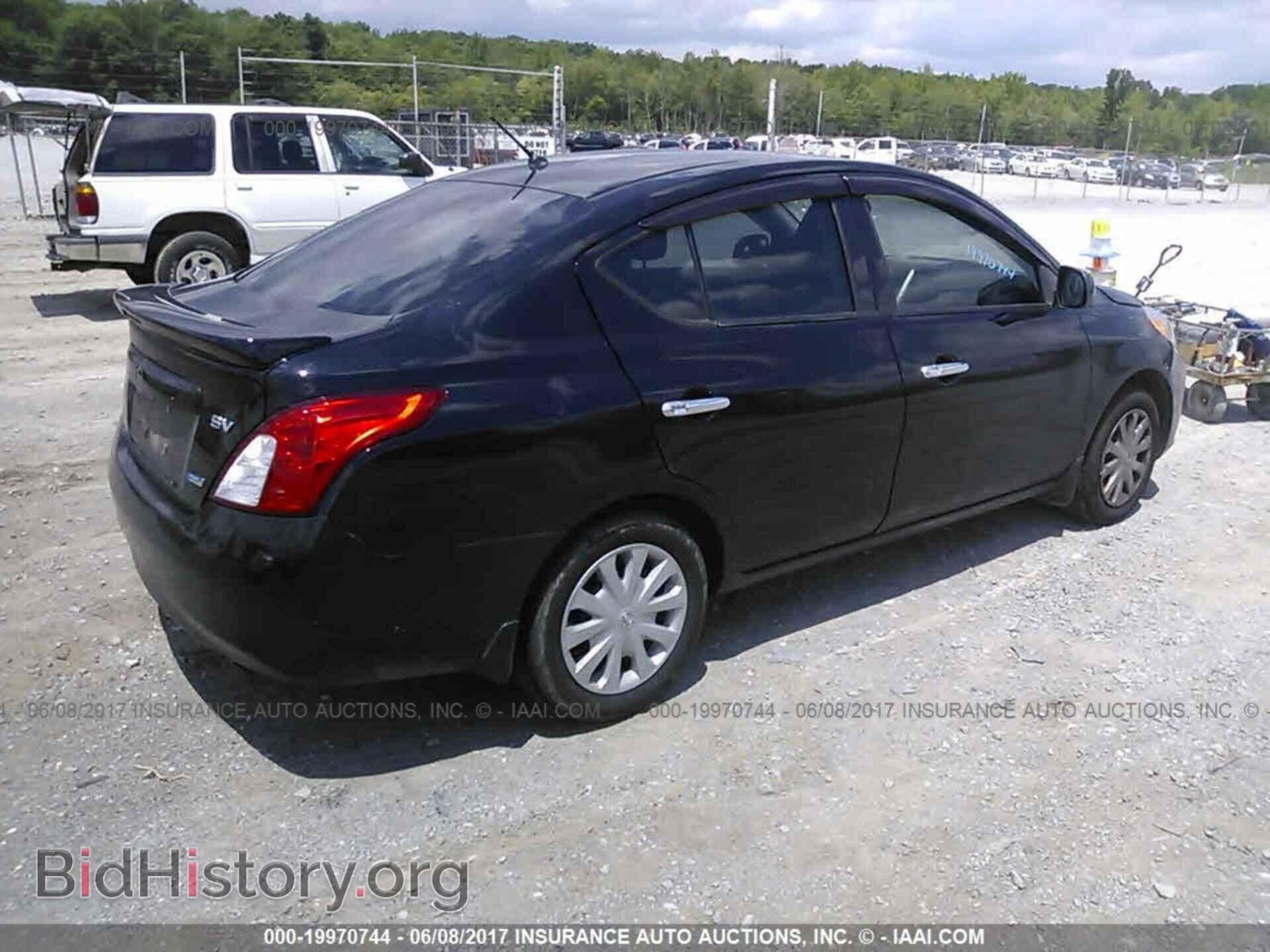 2014 Nissan Versa - VIN: 3N1CN7AP4EL801630 - Фото 4