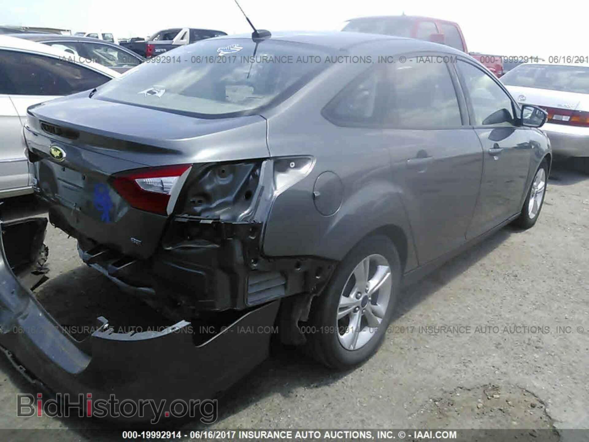 2014 Ford Focus - VIN: 1FADP3F25EL278573 - Фото 4