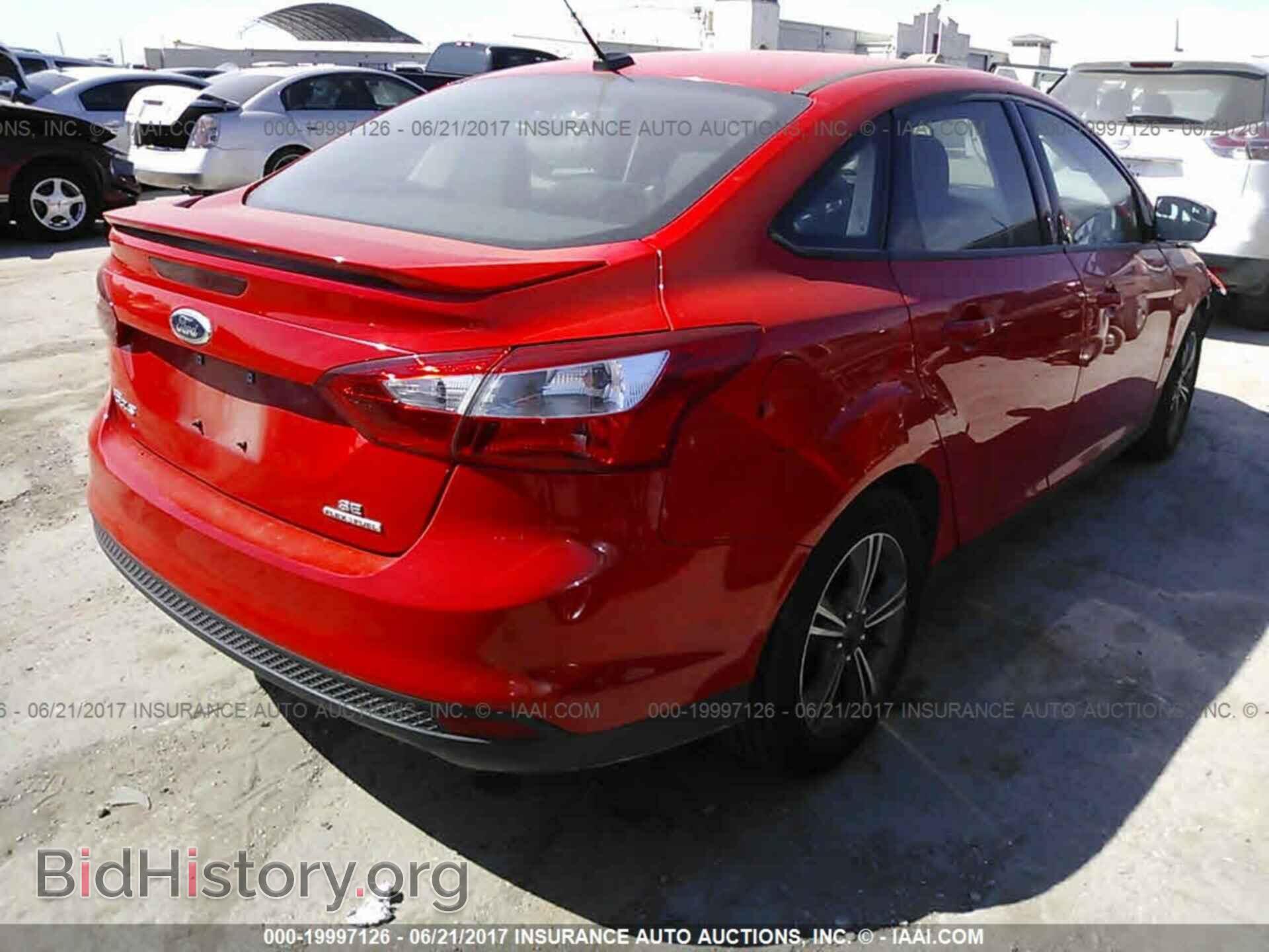 2014 Ford Focus - VIN: 1FADP3F23EL372466 - Фото 4