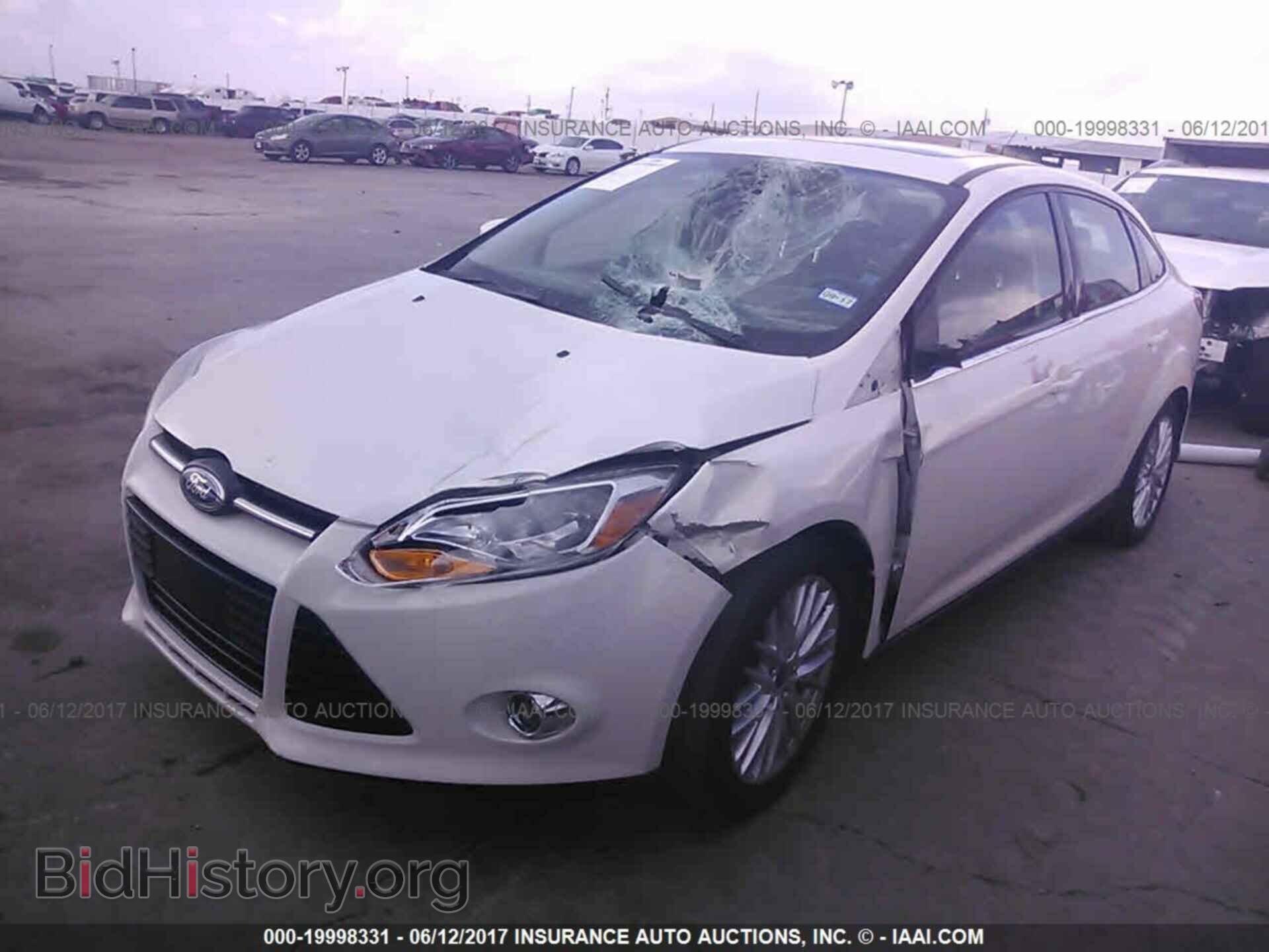2012 Ford Focus - VIN: 1FAHP3H24CL311817 - Photo 2