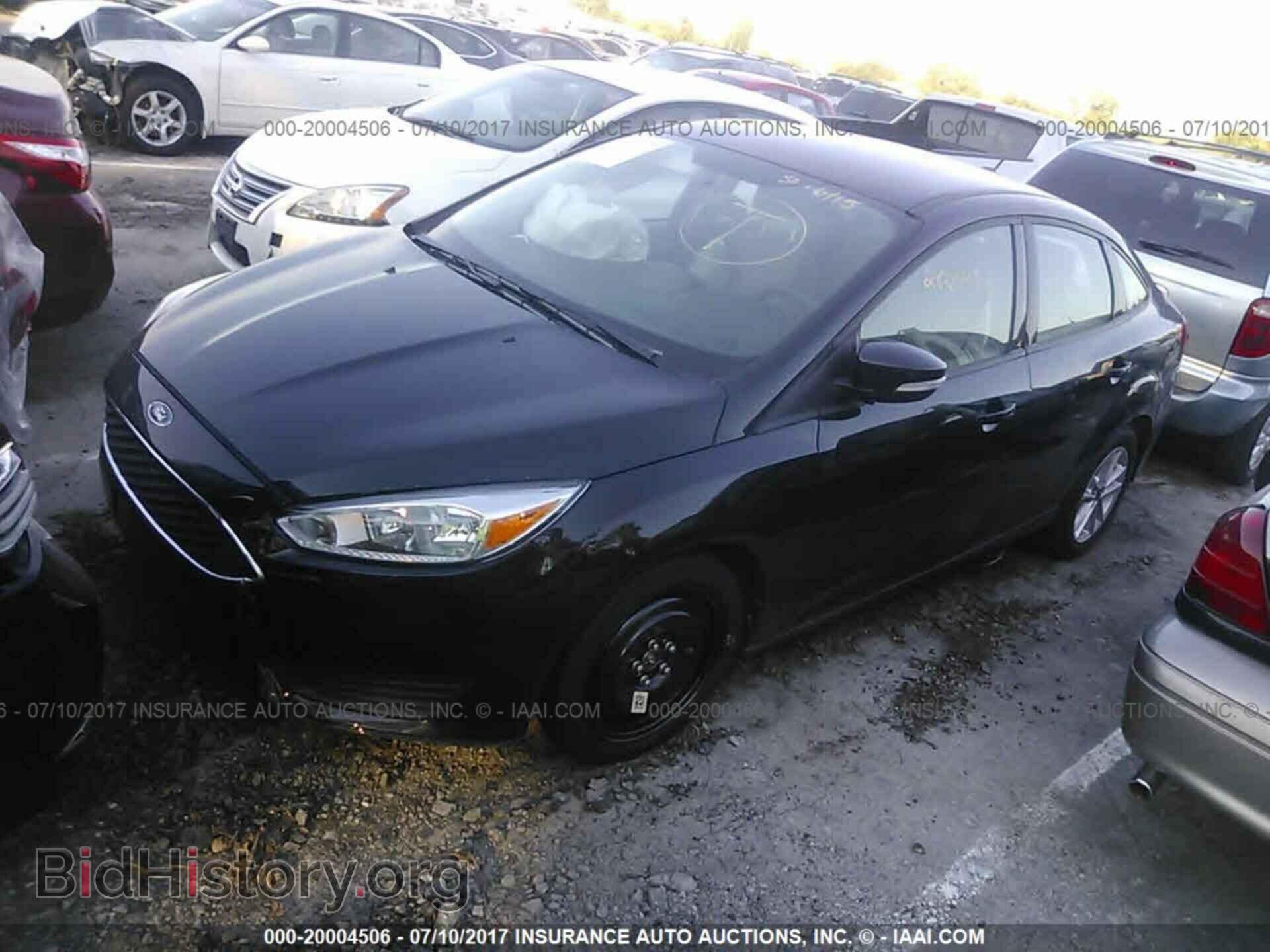 2016 Ford Focus - VIN: 1FADP3F24GL407499 - Photo 2