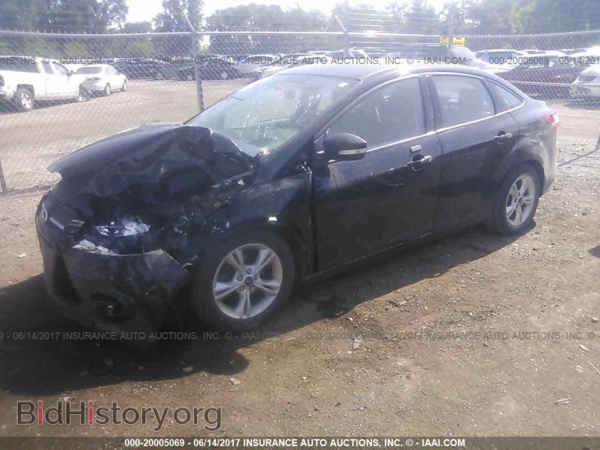 2014 Ford Focus - VIN: 1FADP3F20EL437709 - Фото 2
