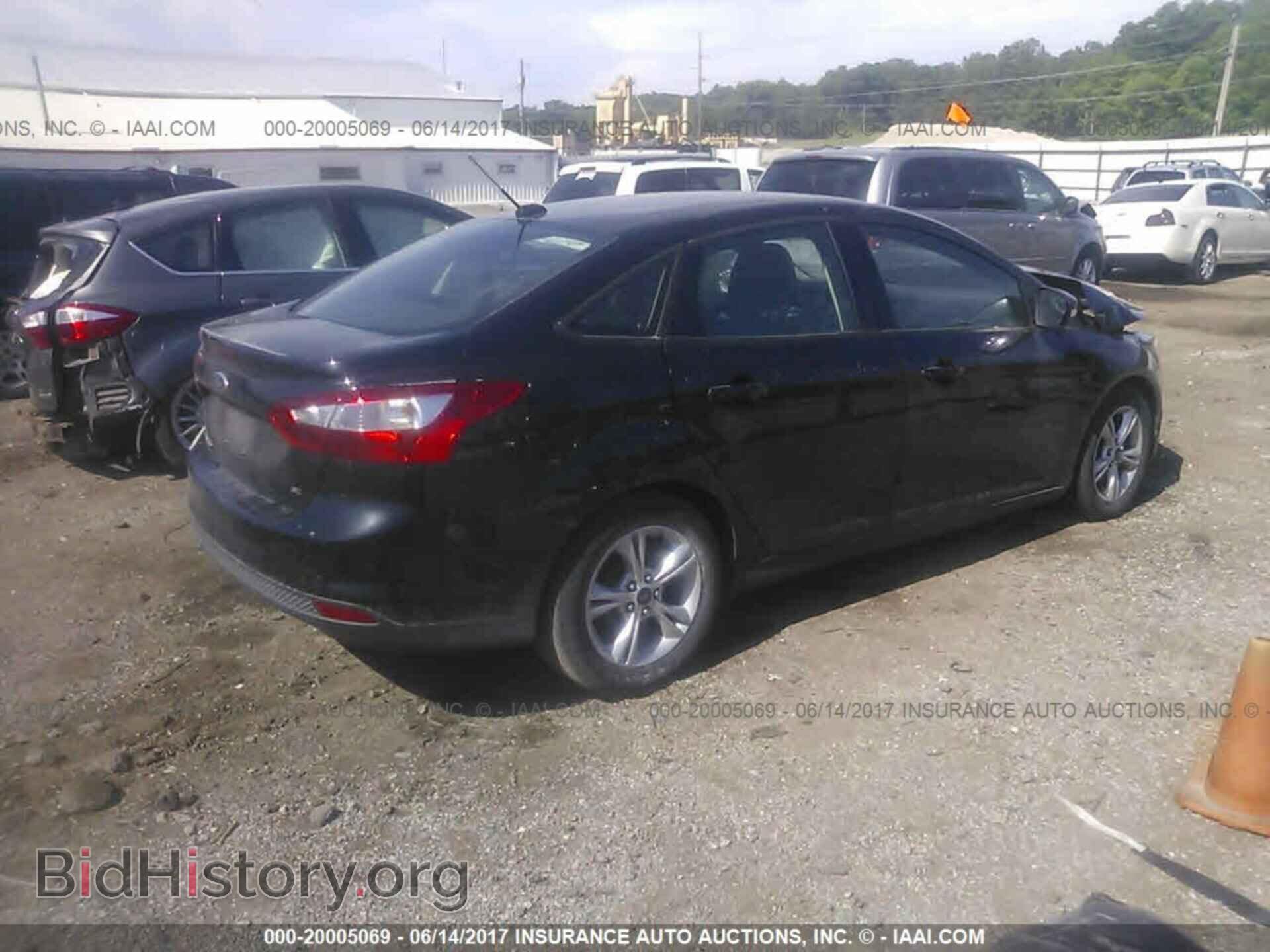 2014 Ford Focus - VIN: 1FADP3F20EL437709 - Фото 4