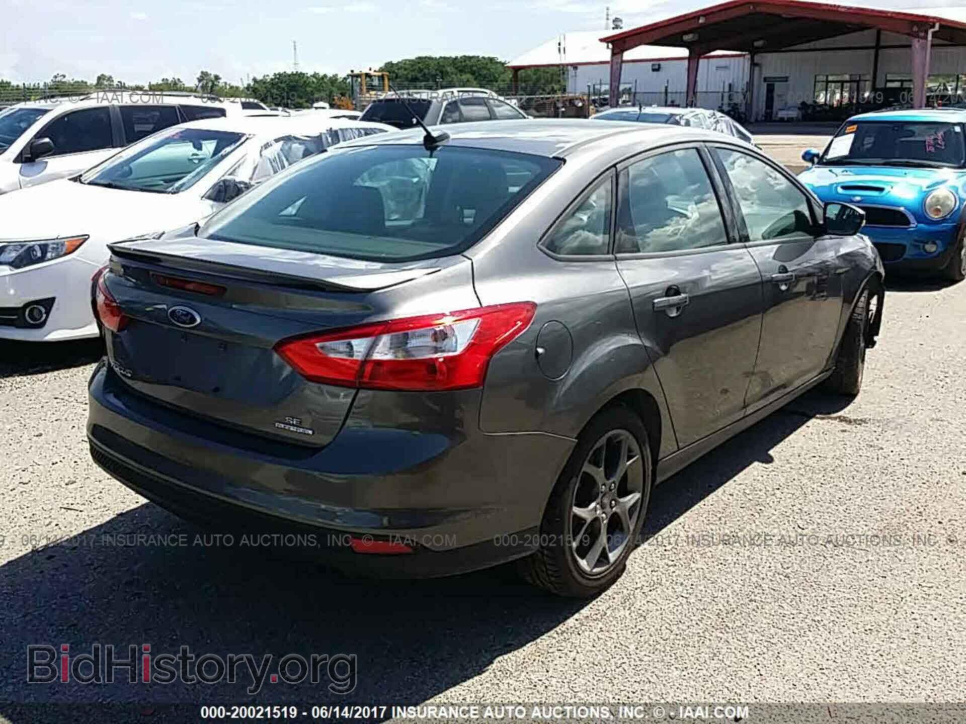 2013 Ford Focus - VIN: 1FADP3F21DL285048 - Photo 4