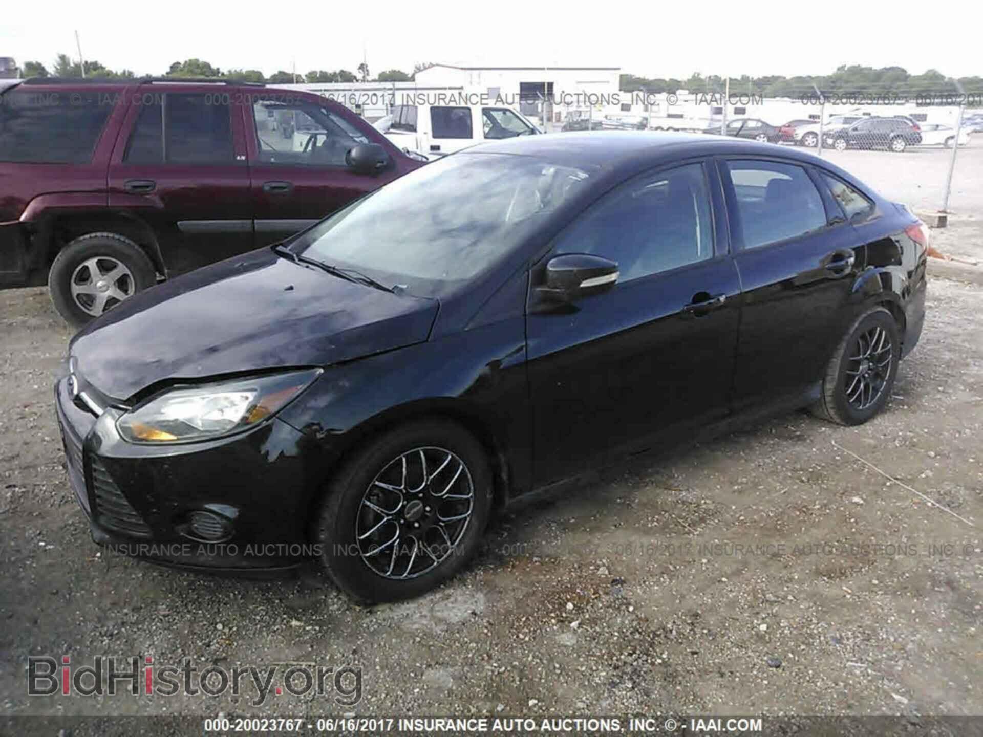 2014 Ford Focus - VIN: 1FADP3F23EL105764 - Photo 2