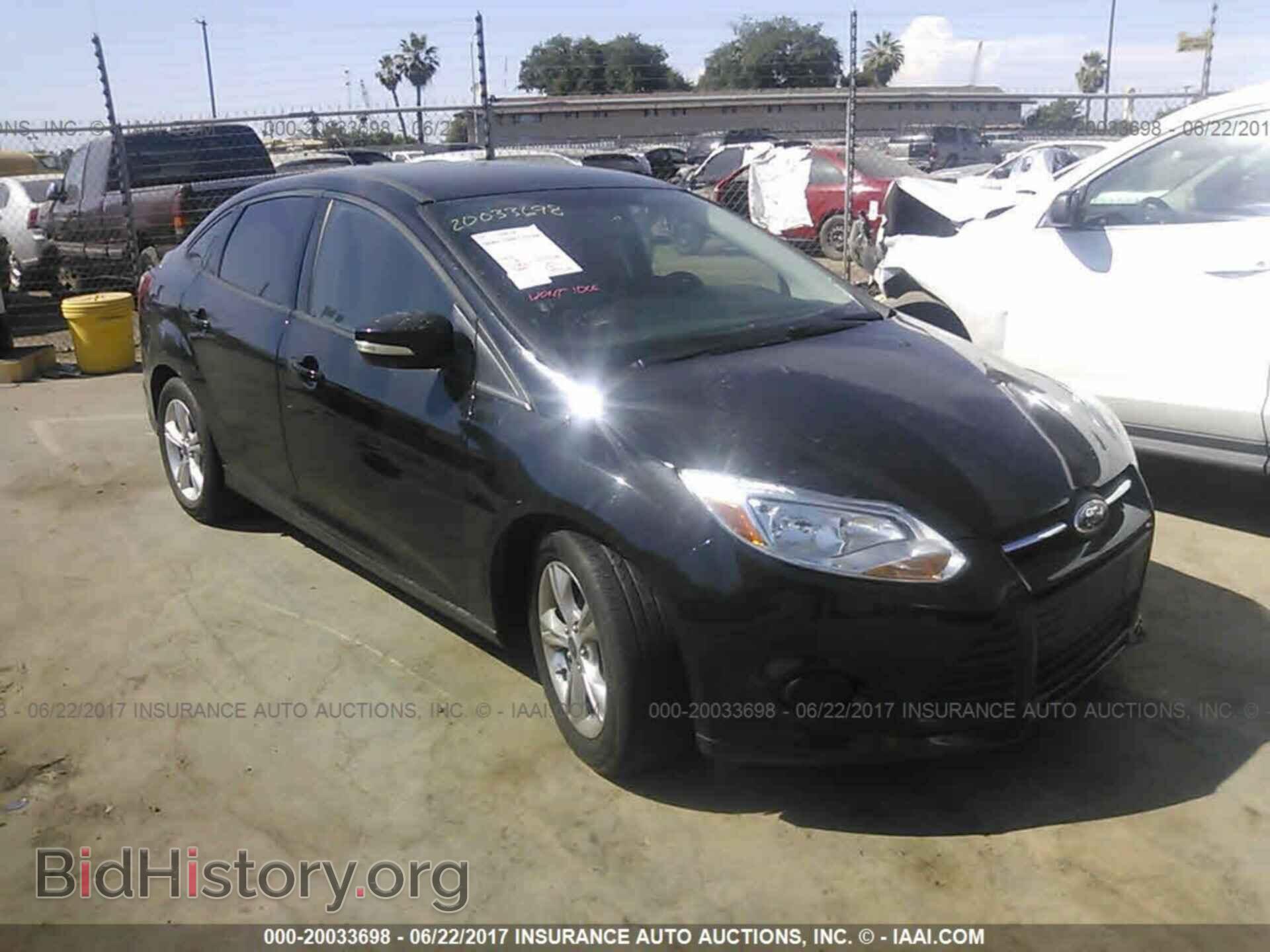Photo 1FADP3F26EL282101 - Ford Focus 2014