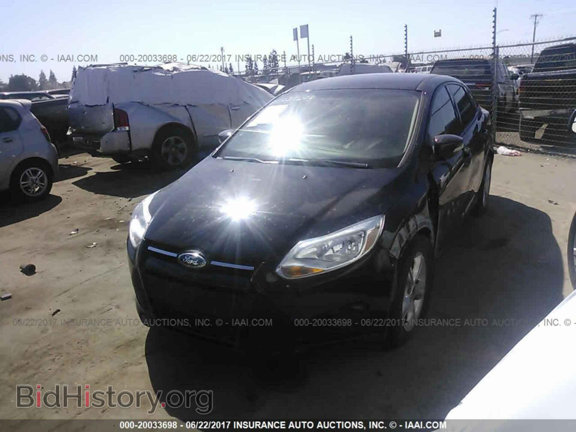 2014 Ford Focus - VIN: 1FADP3F26EL282101 - Photo 2