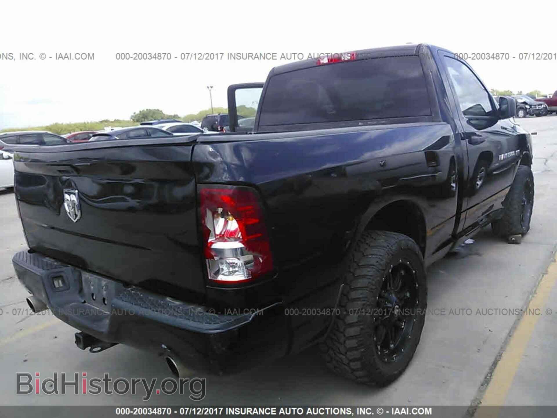 2012 Dodge Ram 1500 - VIN: 3C6JD6ATXCG108492 - Фото 4