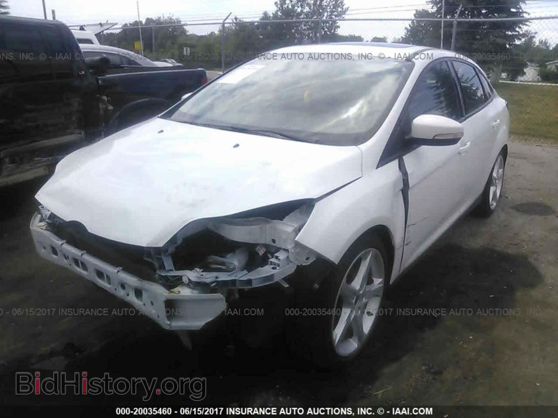 2014 Ford Focus - VIN: 1FADP3F20EL177375 - Фото 2