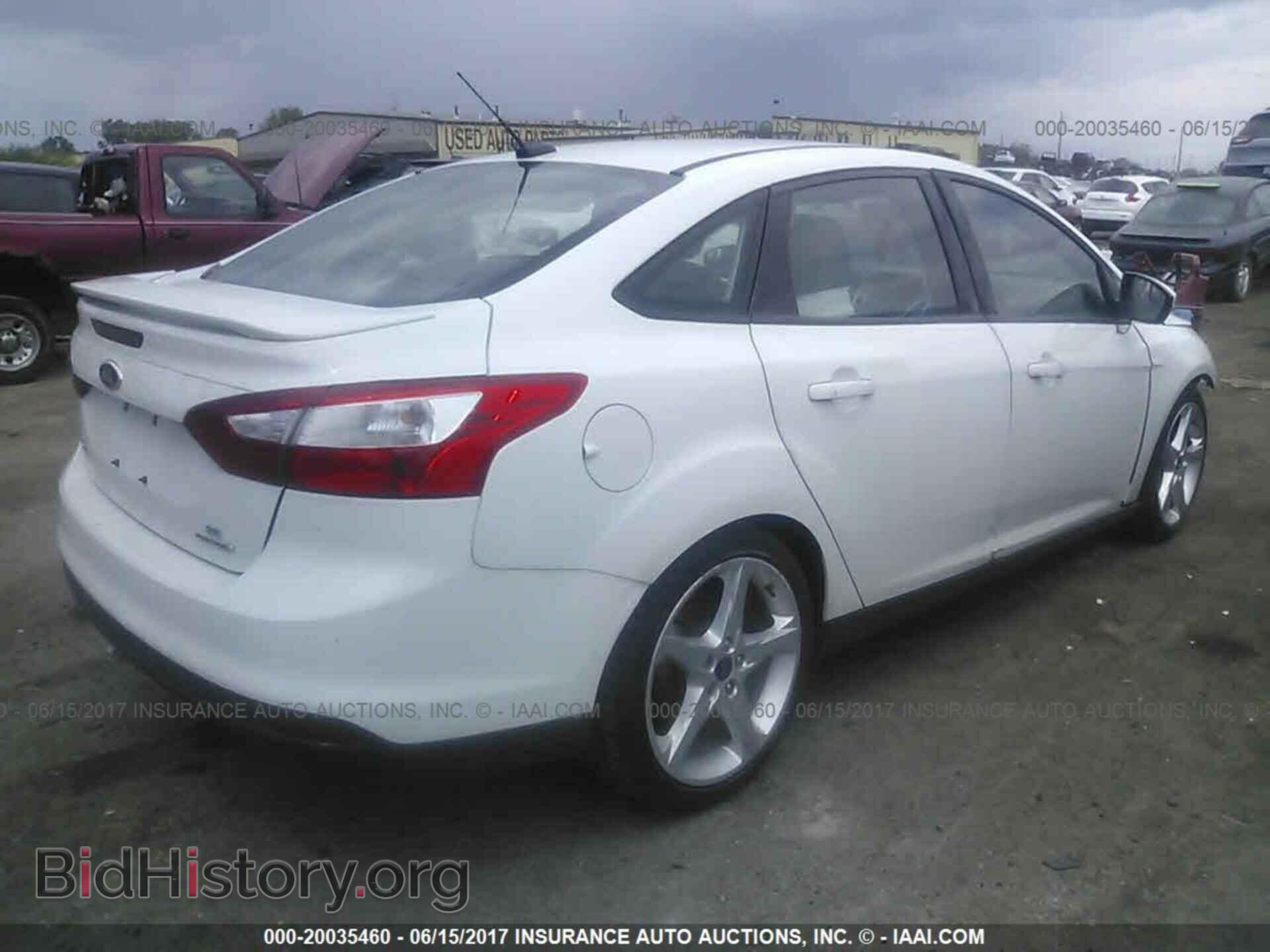 2014 Ford Focus - VIN: 1FADP3F20EL177375 - Фото 4