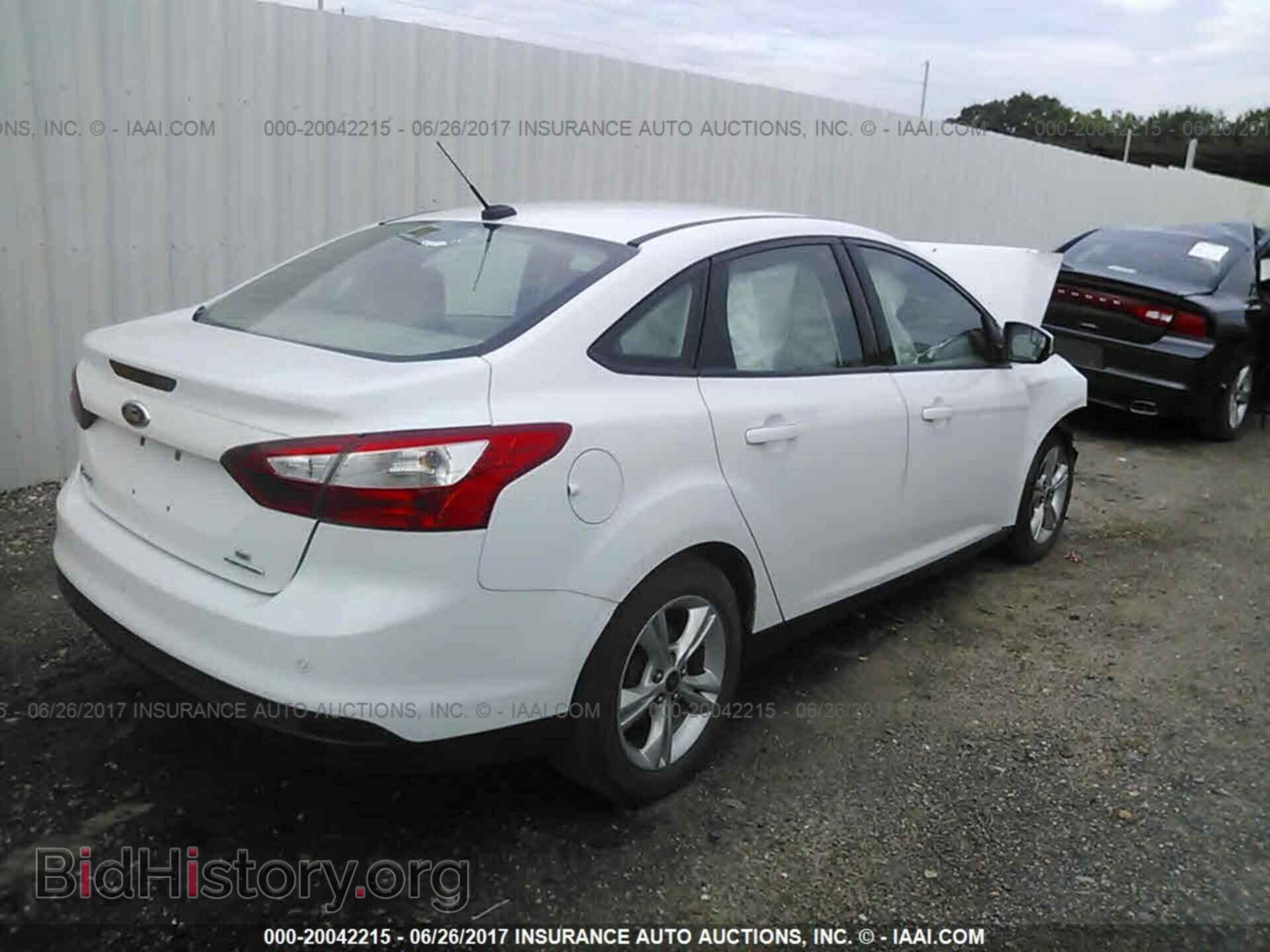 2014 Ford Focus - VIN: 1FADP3F24EL190839 - Photo 4