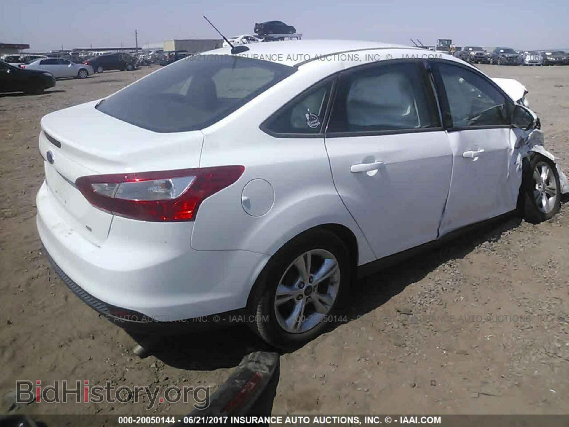 2013 Ford Focus - VIN: 1FADP3F22DL246761 - Photo 4