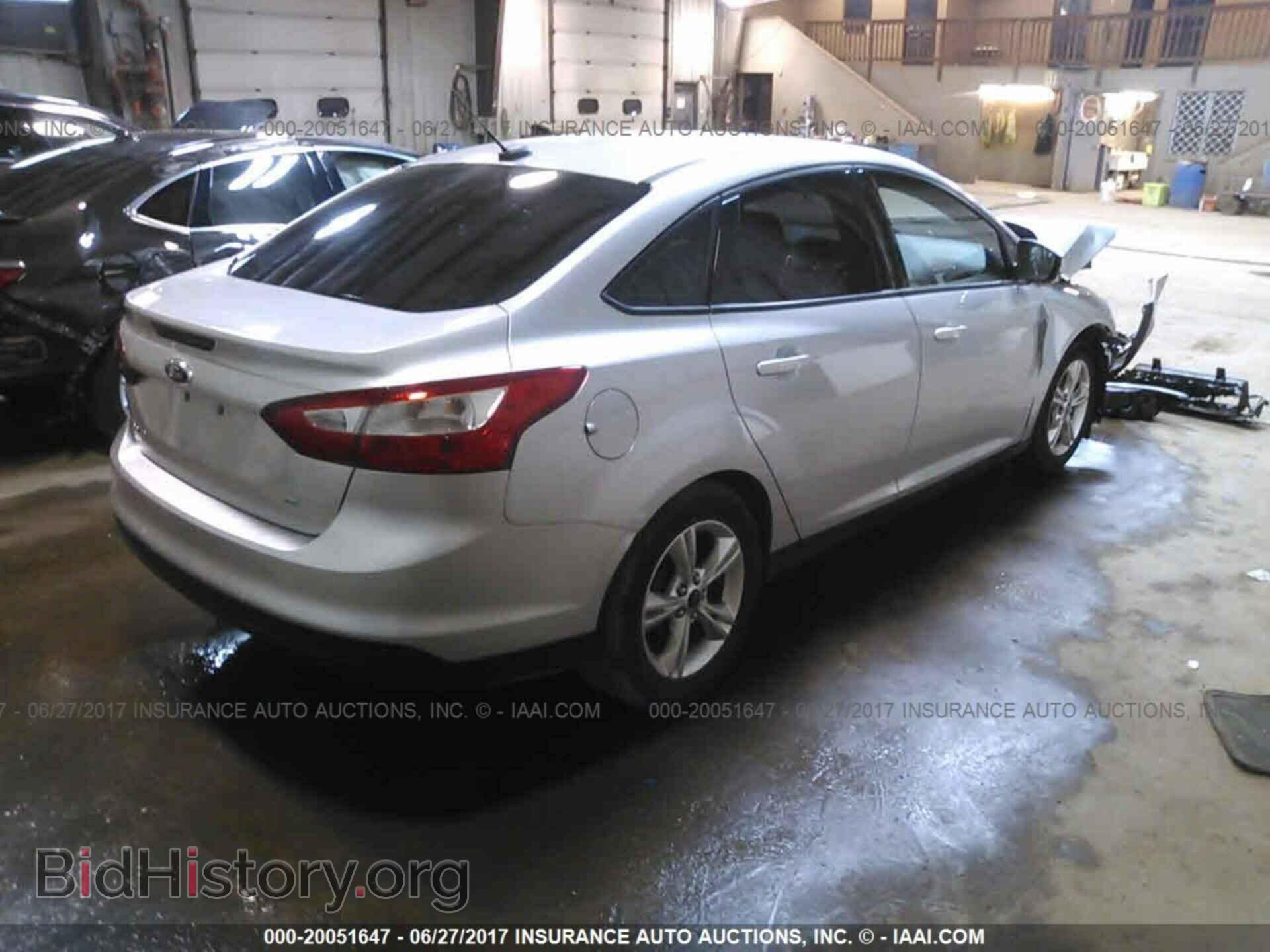 2014 Ford Focus - VIN: 1FADP3F22EL294777 - Фото 4