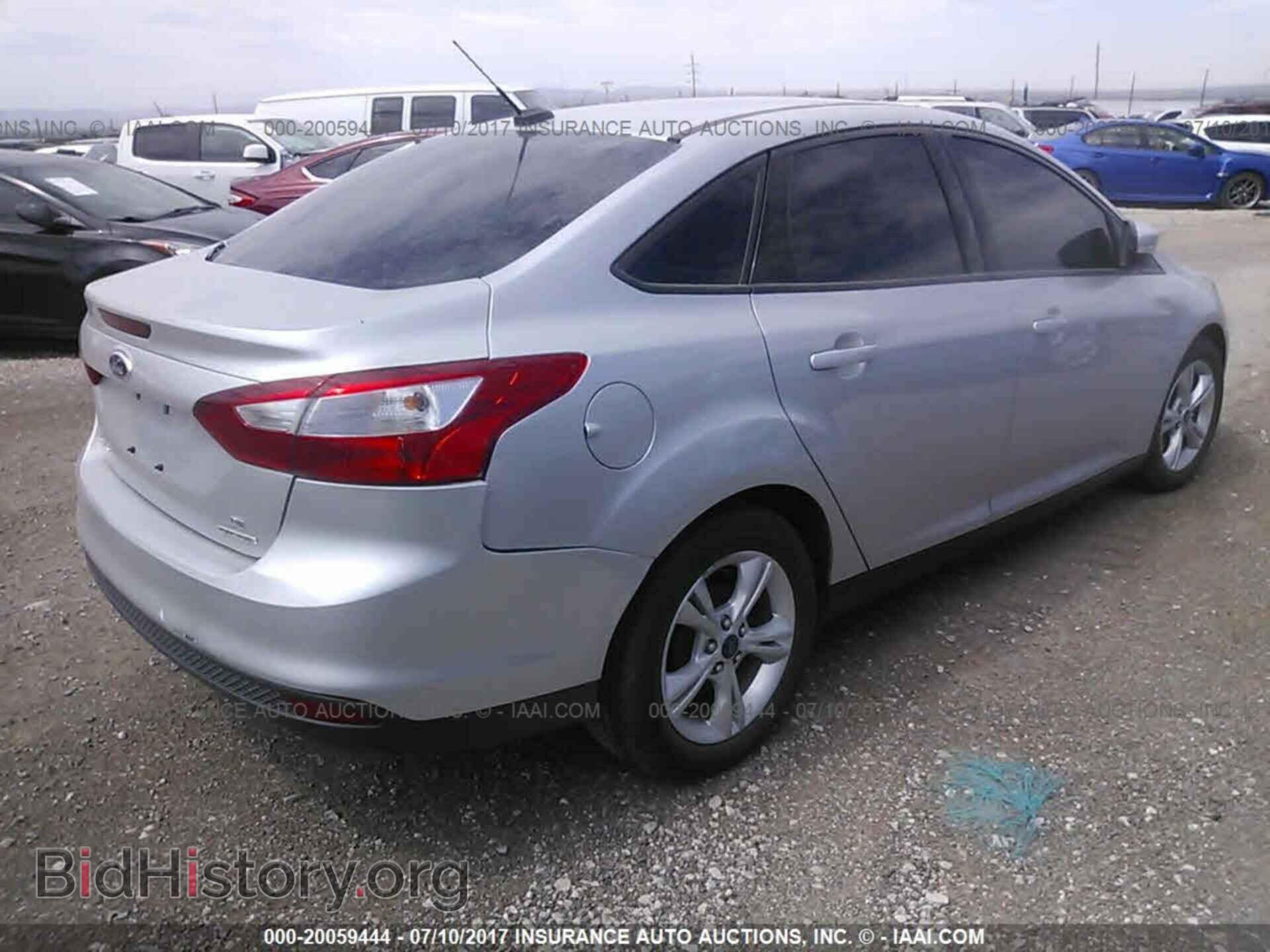 2014 Ford Focus - VIN: 1FADP3F21EL305722 - Photo 4