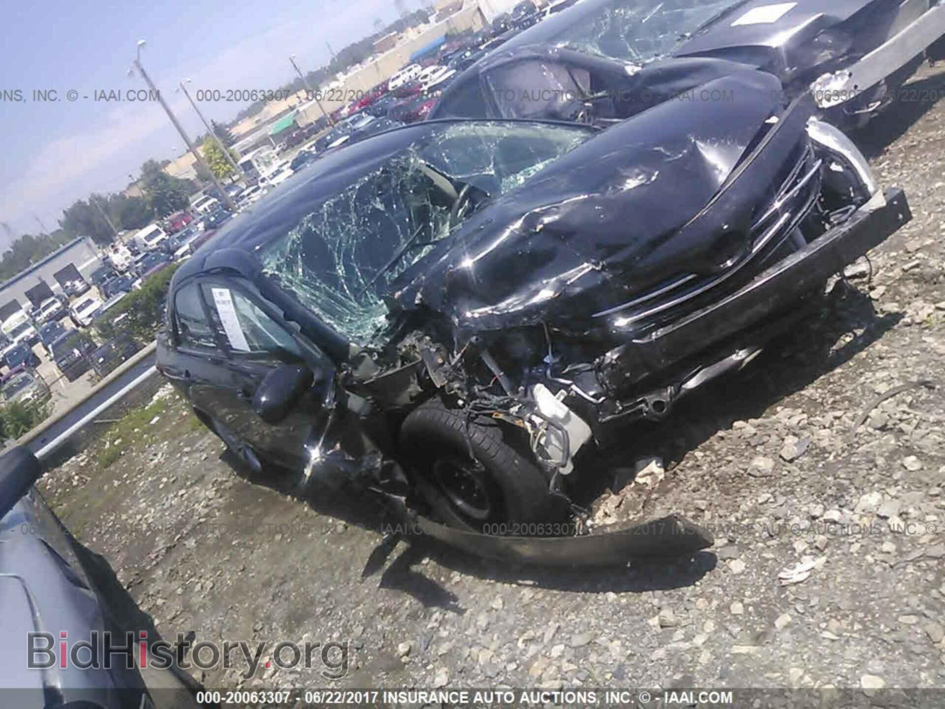 Фотография 2T1BU4EE5DC976120 - Toyota Corolla 2013