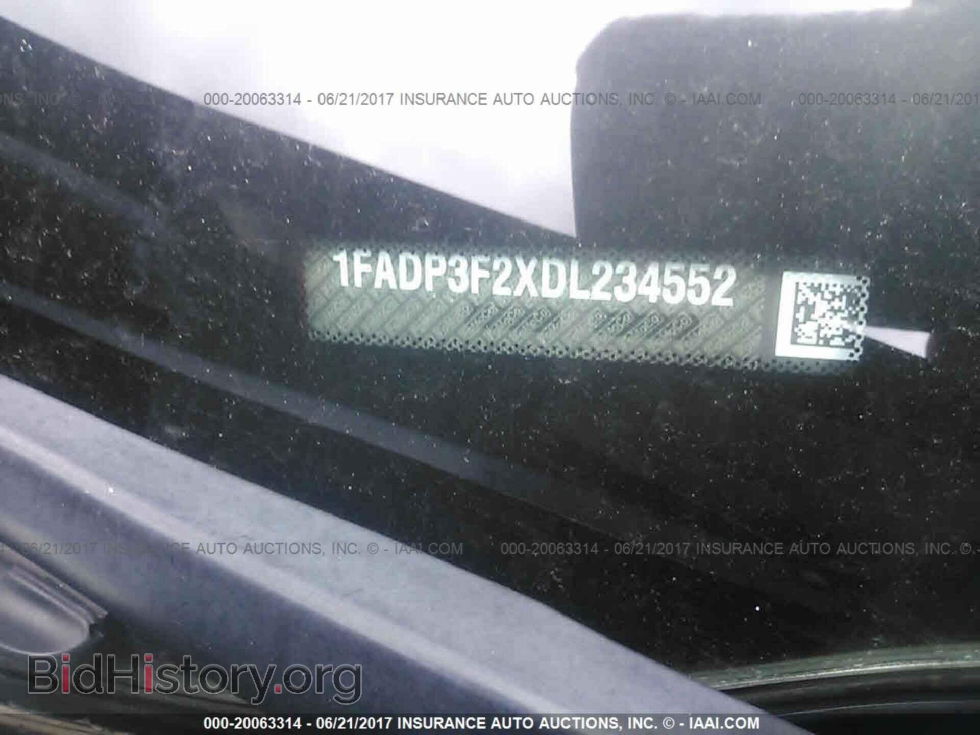 2013 Ford Focus - VIN: 1FADP3F2XDL234552 - Photo 9