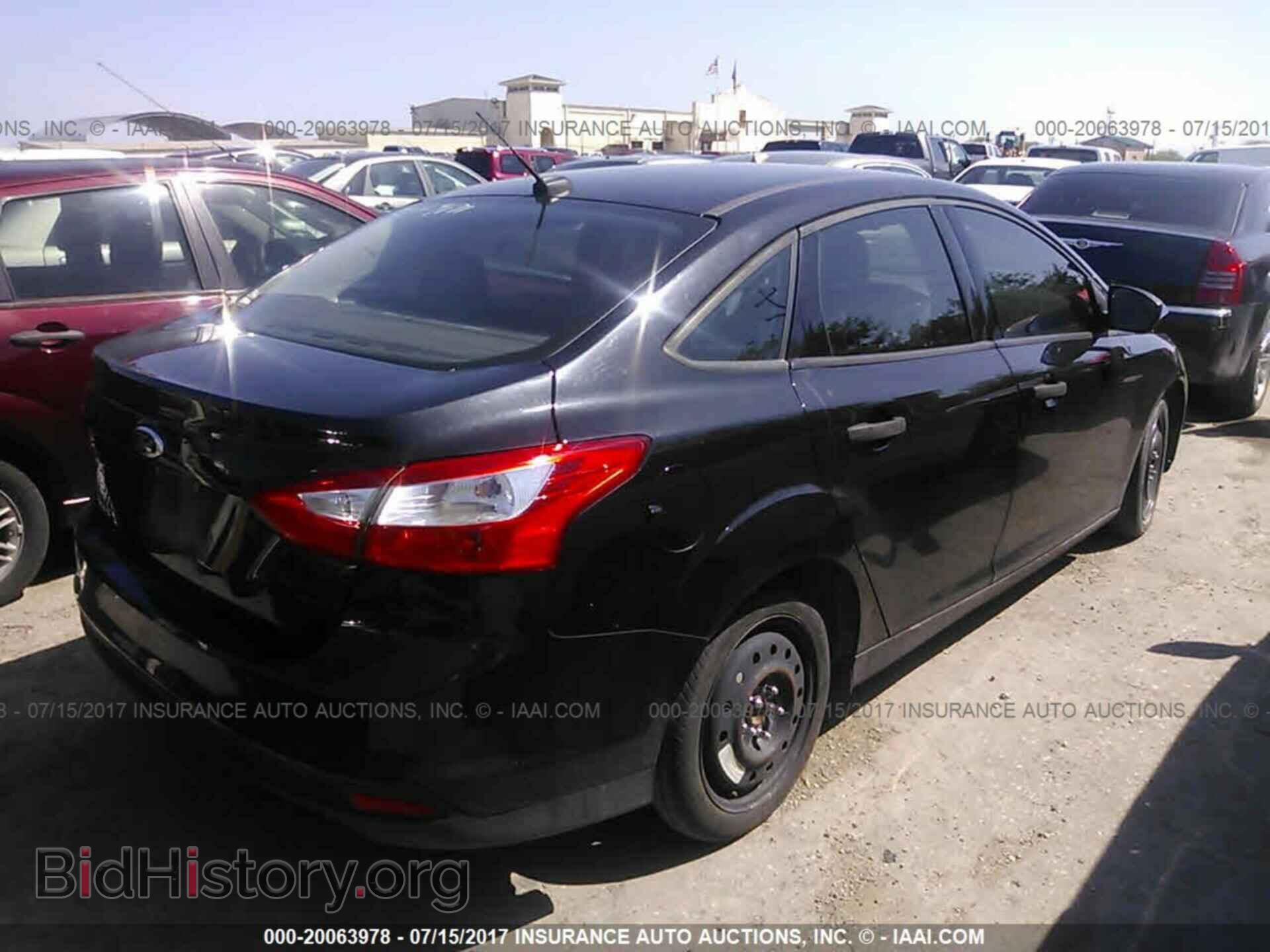 2012 Ford Focus - VIN: 1FAHP3E24CL315953 - Photo 4