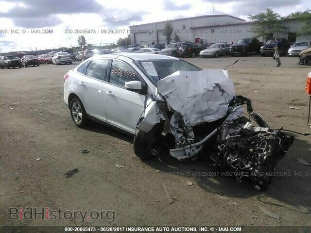 2014 Ford FOCUS (VIN 1FADP3F23EL293377) — фото 1 из 10, IAAI, повреждение: опрокидывание